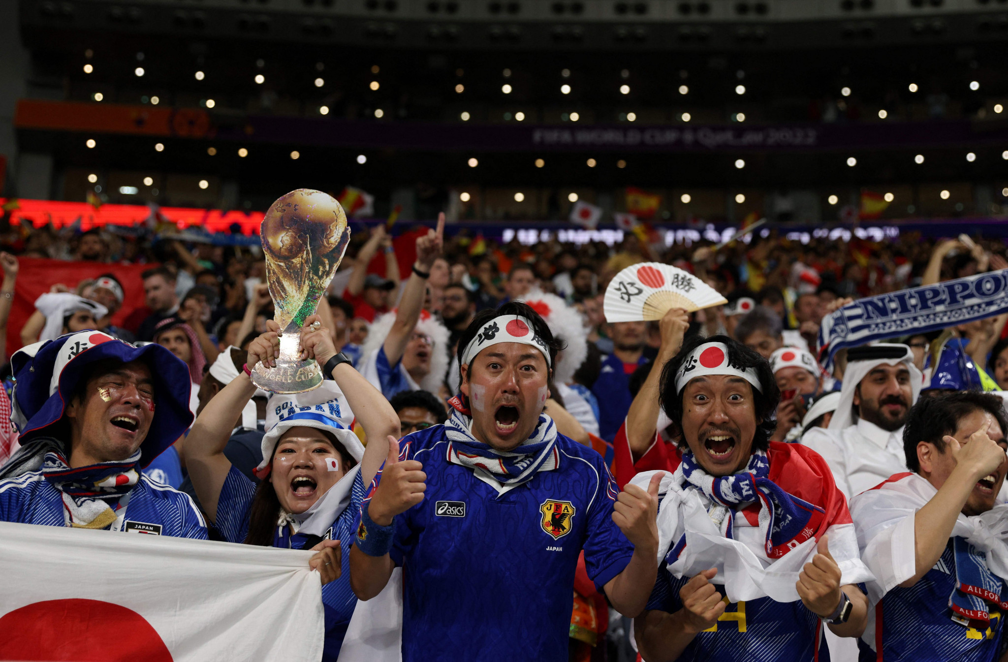 Japan's fans celebrating their lead against Spain ©Getty Images