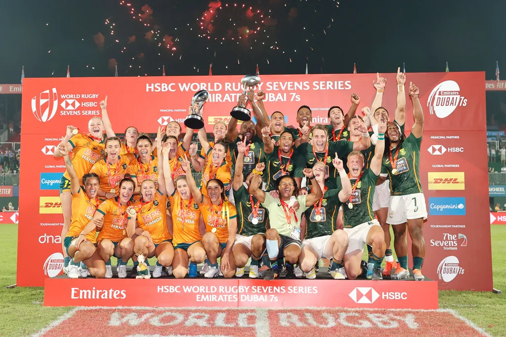 Australia and South Africa celebrate after their respective women's and men's teams take the titles in Dubai ©World Rugby
