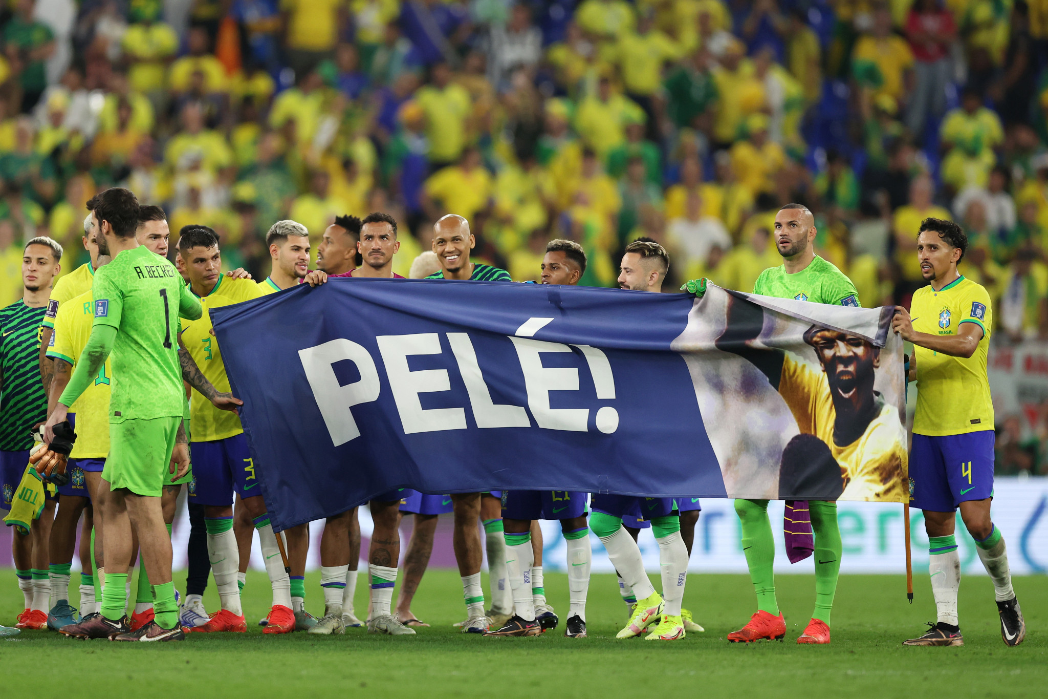 Brazil players brought out a banner of Pelé, who is unwell in hospital, at the end of the match ©Getty Images