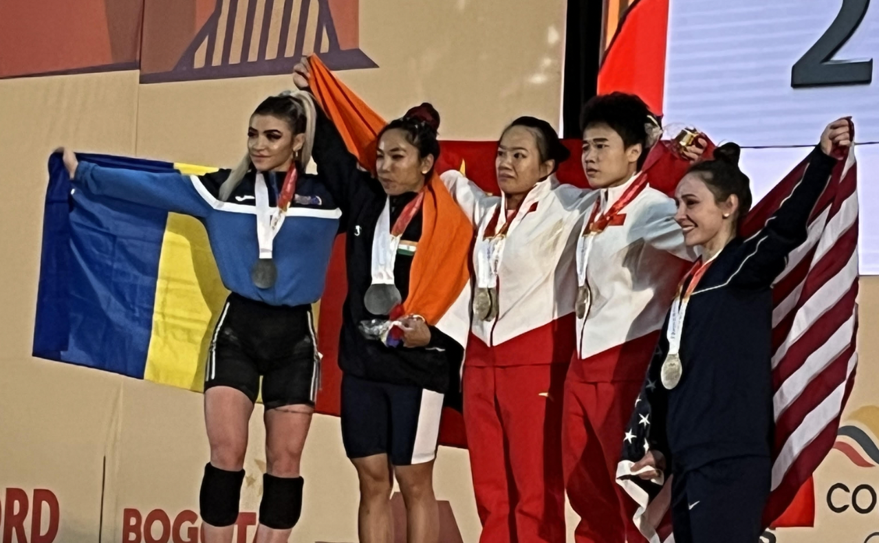 Jiang Huihua, centre, won gold for China in the women's 49kg ©ITG