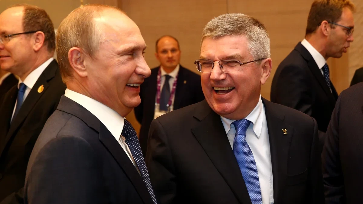Thomas Bach, right, has faced accusations that he is too close to Russian President Vladimir Putin, left, since his election in 2013 ©Getty Images