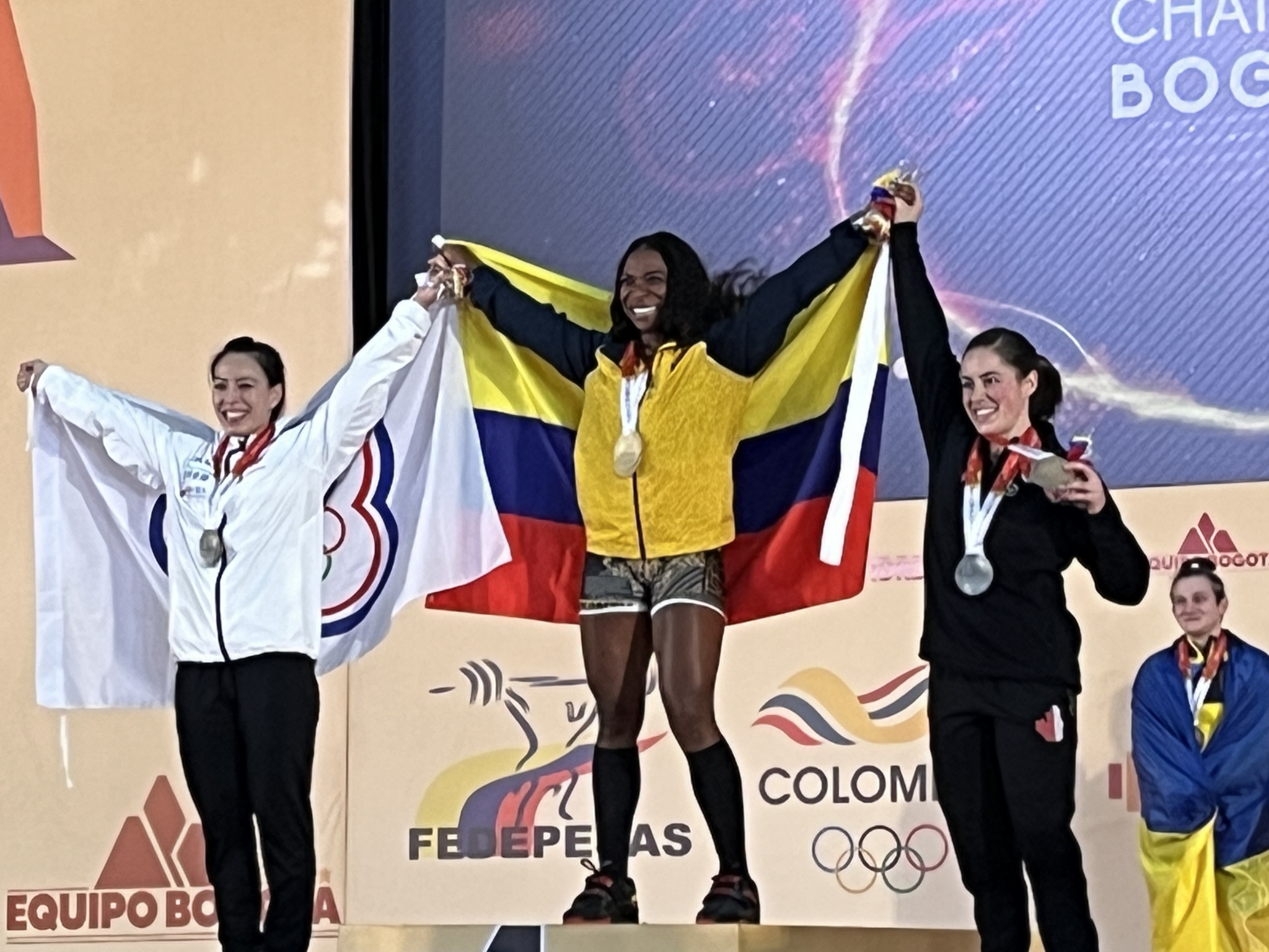 Colombian Yenny Álvarez, centre, won the women's 59kg title, defeating two Olympic champions ©ITG