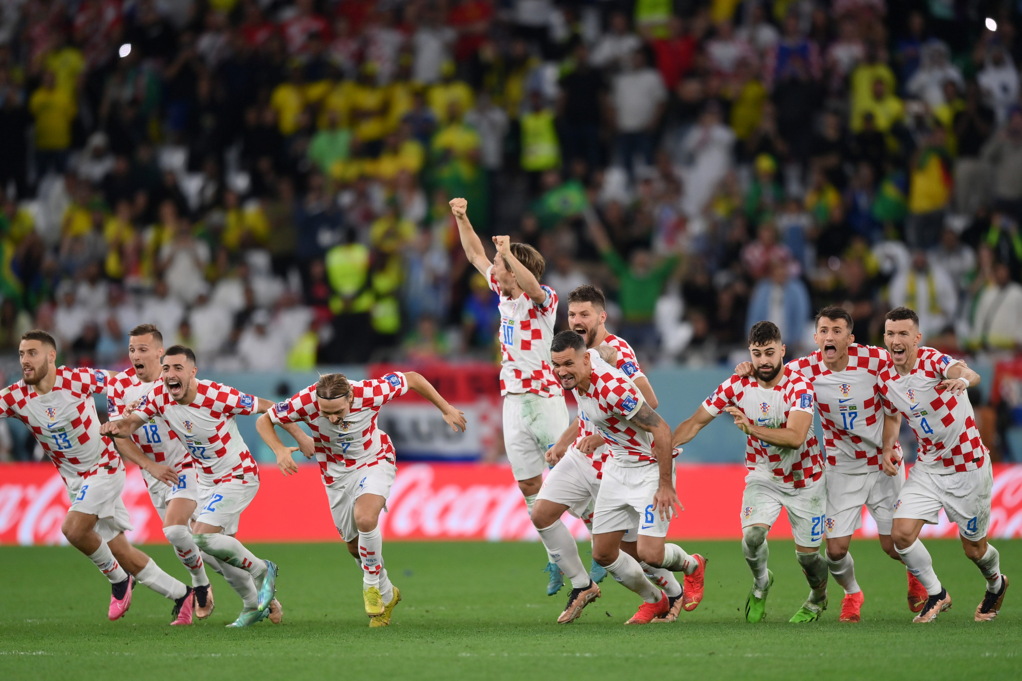 Croatia's players celebrate after beating Brazil on penalties to reach the World Cup semi-finals ©Getty Images