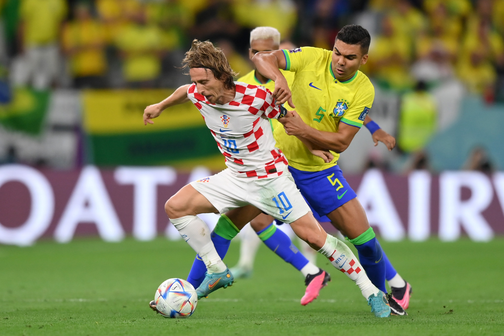 Croatia's Luka Modric shields the ball during his side's win over Brazil on penalties ©Getty Images
