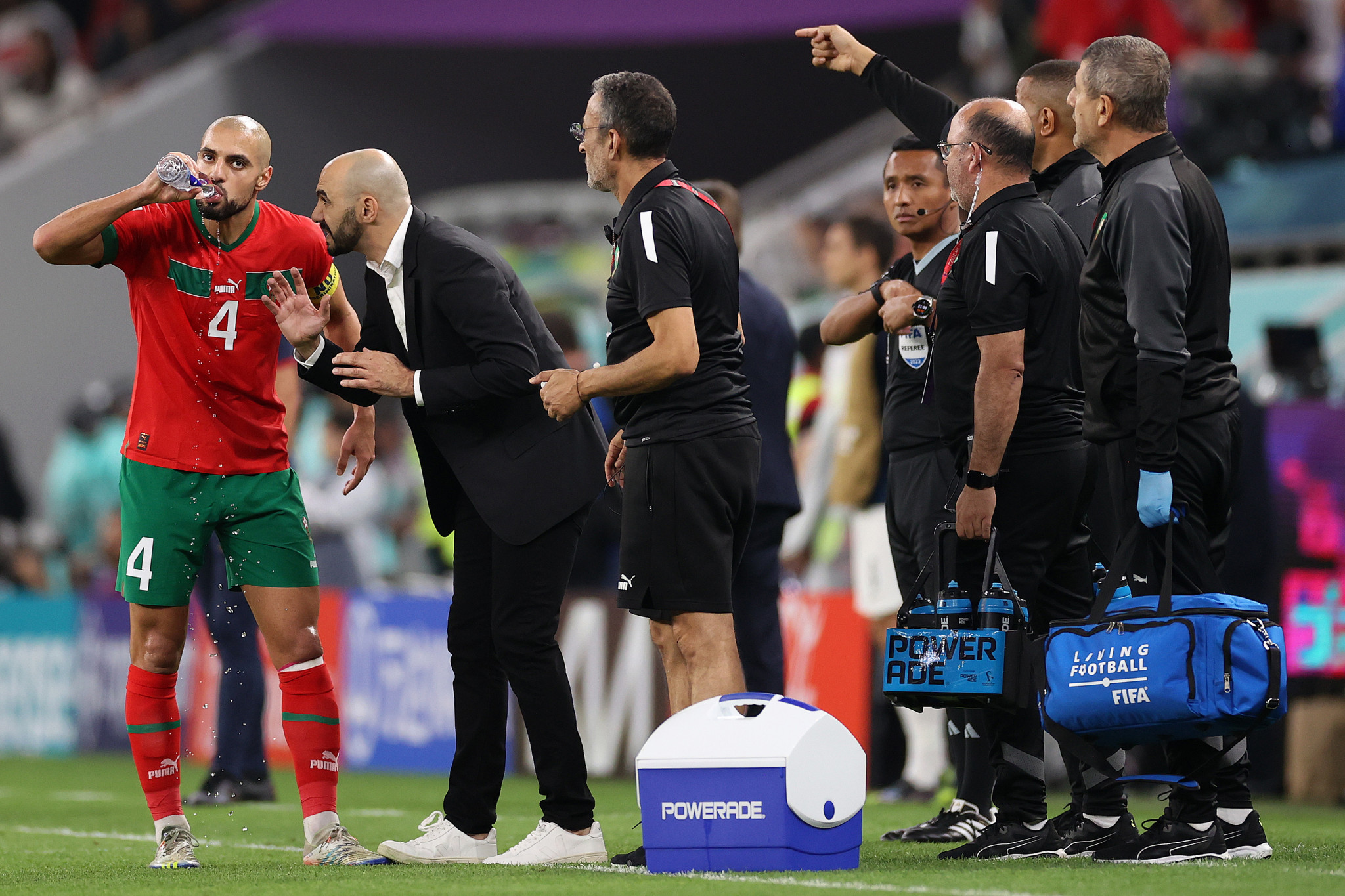 Walid Regragui, second left, has been Morocco manager for fewer than four months yet has already led the team on a historic run ©Getty Images