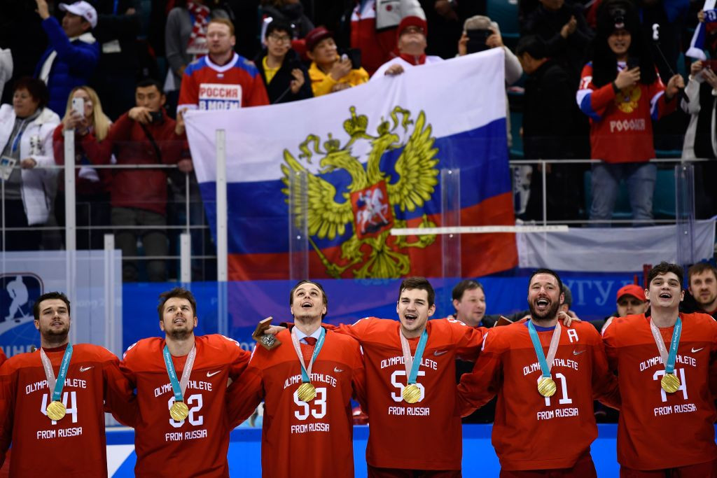 Russia's ice hockey gold medallists sing the national anthem at the Pyeongchang 2018 Winter Games as their flag flies - all against the IOC rules of the time ©Getty Images