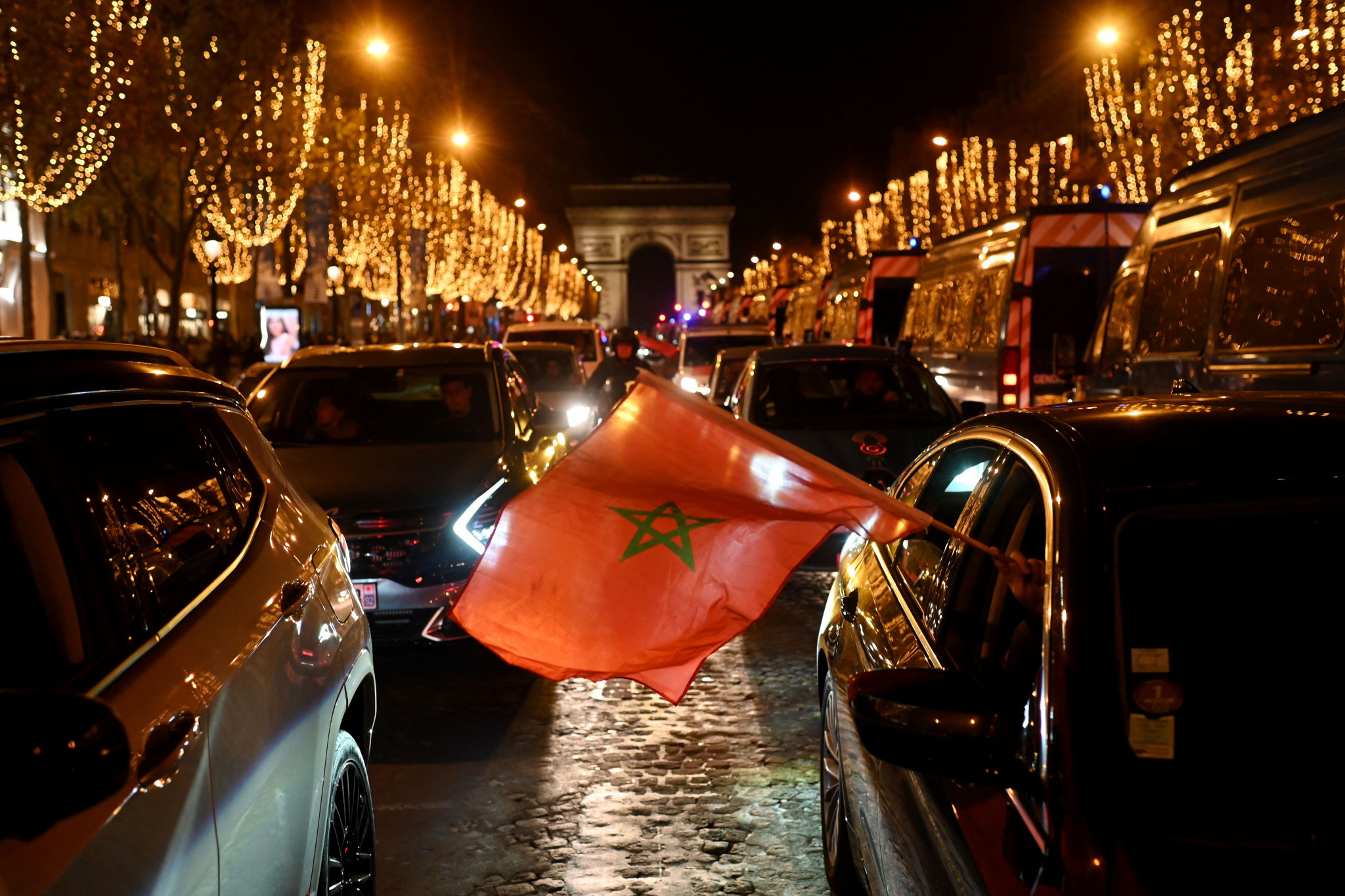 Fans gathered on the Champs-Élysées to celebrate victories for Morocco and France ©Getty Images
