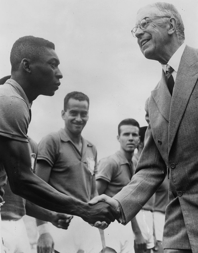 Pelé, 17, shakes hands with Gustav VI Adolf, King of Sweden, before the 1958 World Cup final in Gothenburg ©Getty Images
