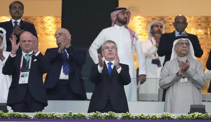 IOC President Thomas Bach, centre, will miss this year's FIFA World Cup final in Doha after recently contracting COVID-19 ©Getty Images