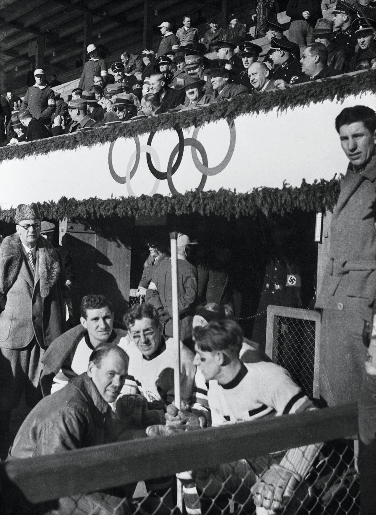 The British players pose in the dug out as Adolf Hitler watches their Olympic match against Hungary ©IOC