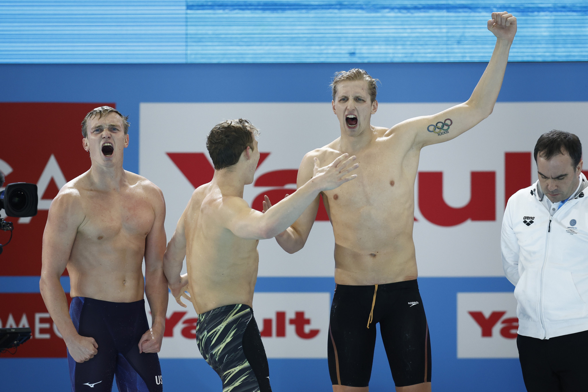 The US team roar with delight after capturing the men's 4x200m freestyle relay crown ©Getty Images