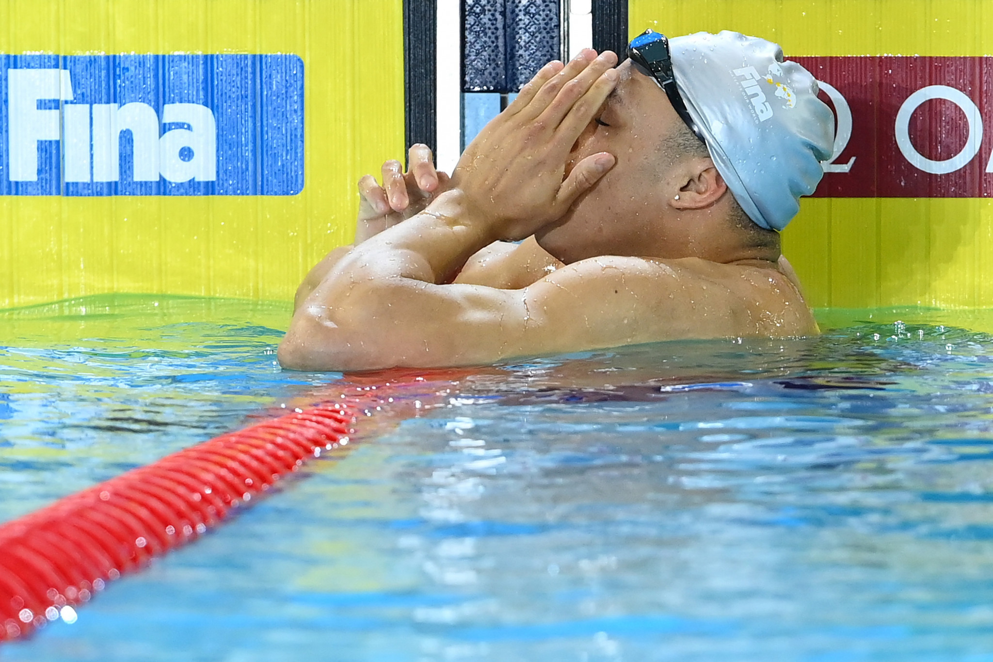 Jordan Crooks of the Cayman Islands looks in disbelief after winning men's 50 metres freestyle gold ©Getty Images