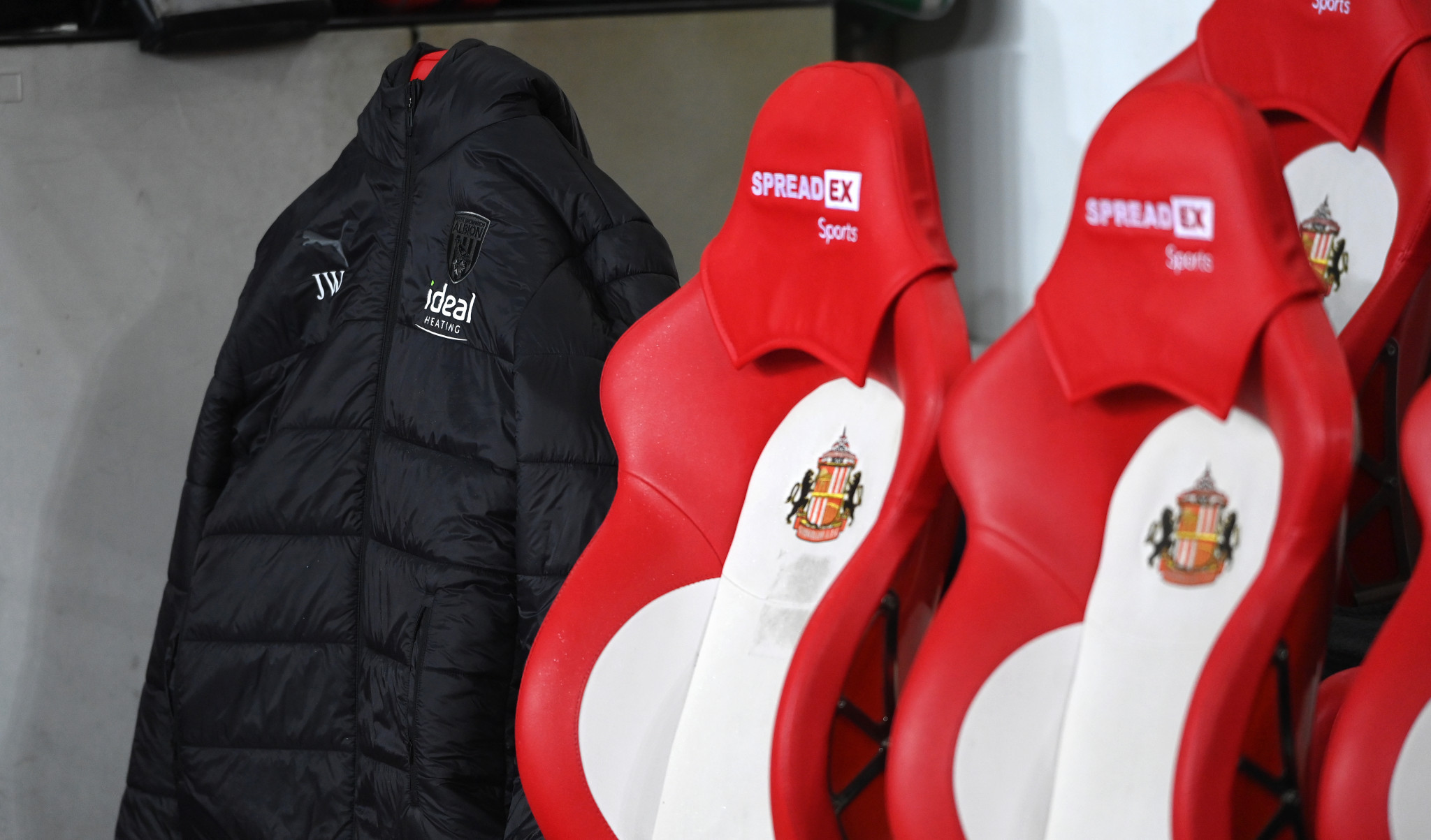 Julian Widdowson's jacket on his vacant seat on the West Bromwich Albion bench ©Getty Images