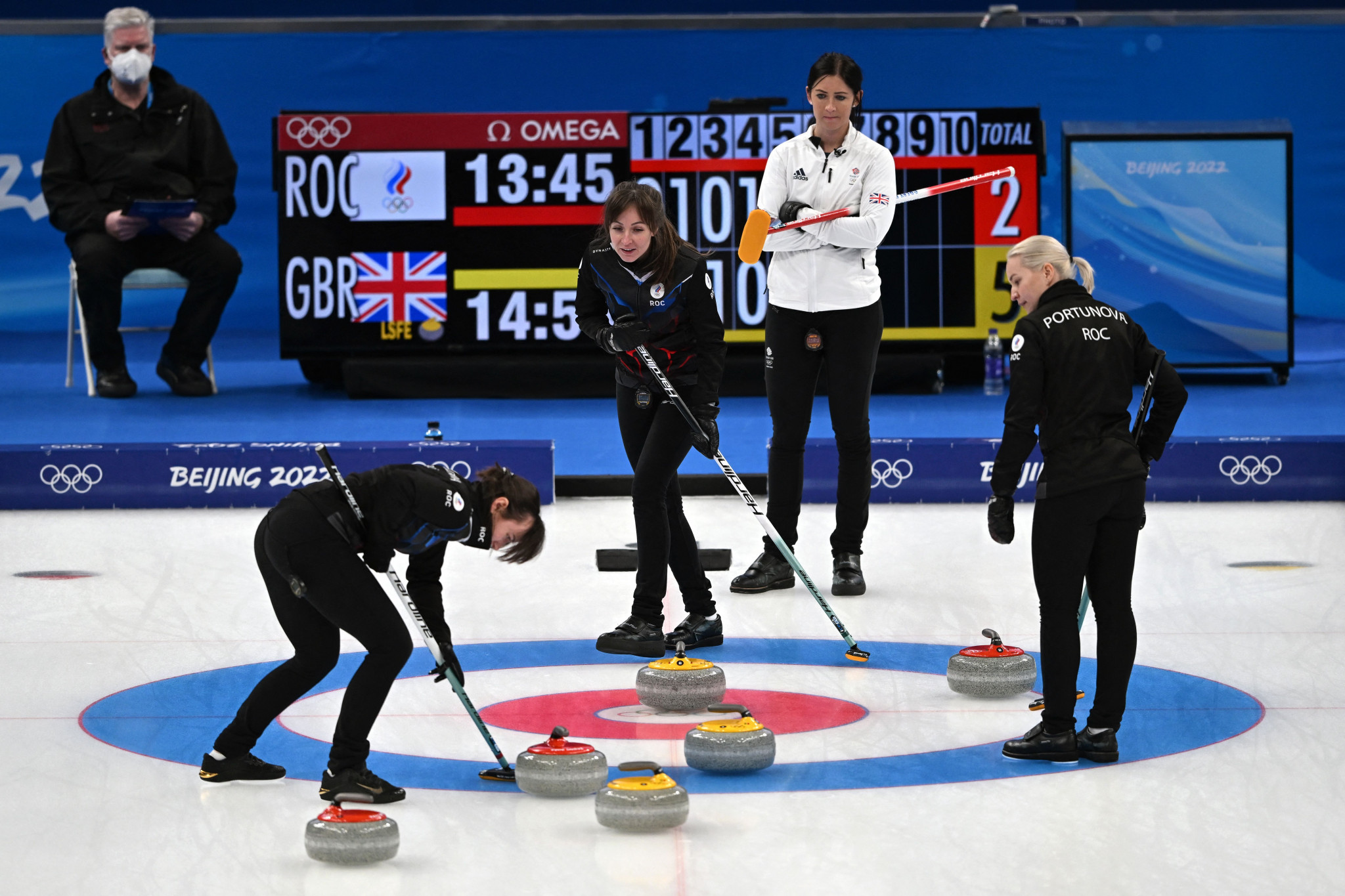 Russian curlers (dark shirts) competed as Russian Olympic Committee at Beijing 2022 but a suspension was imposed after the invasion of Ukraine ©Getty Images