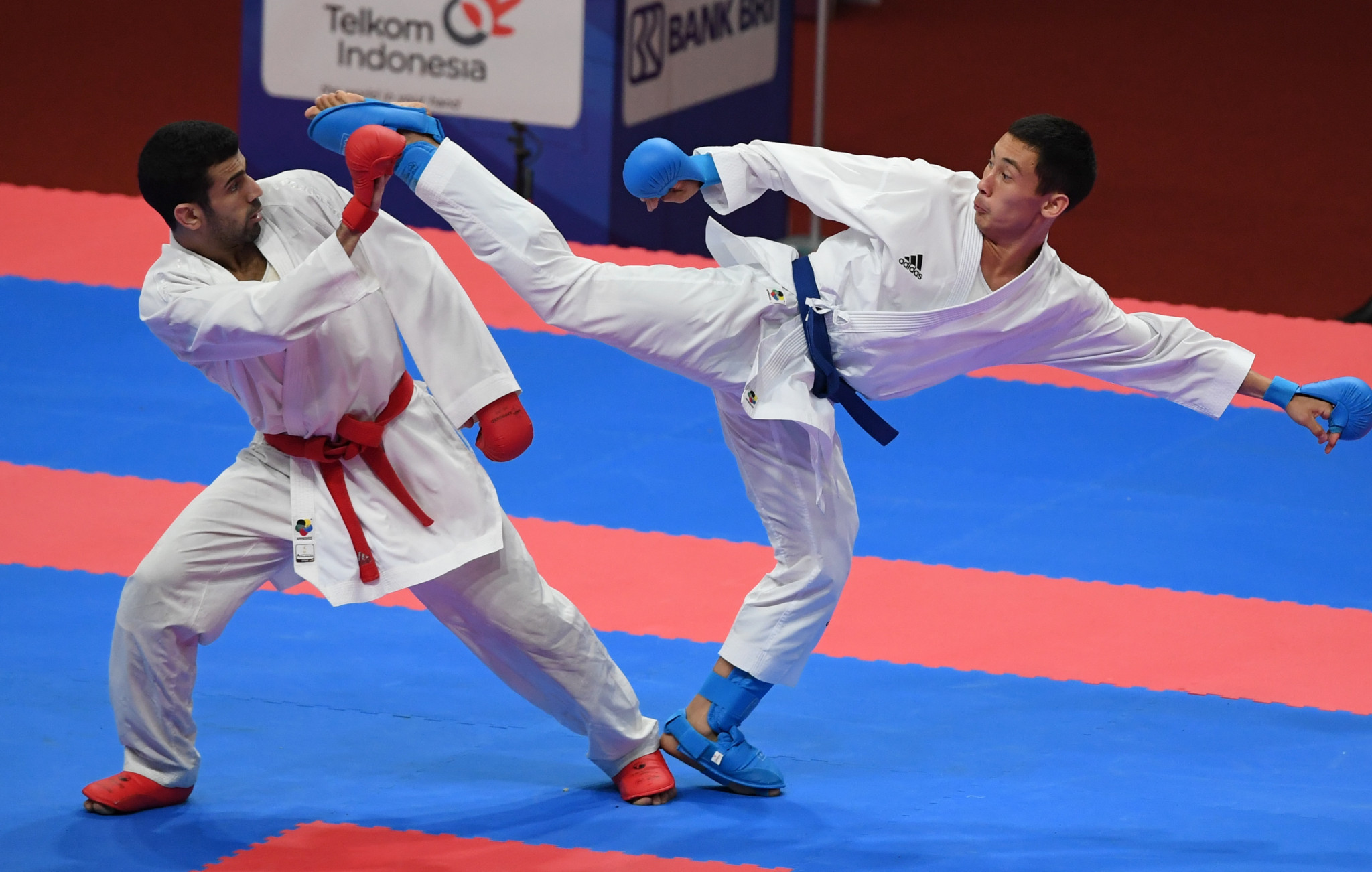 Kazakhstan's Didar Amirali, right, claimed the bronze medal in the men's under-67kg event at the Asian Karate Championships in Tashkent ©Getty Images