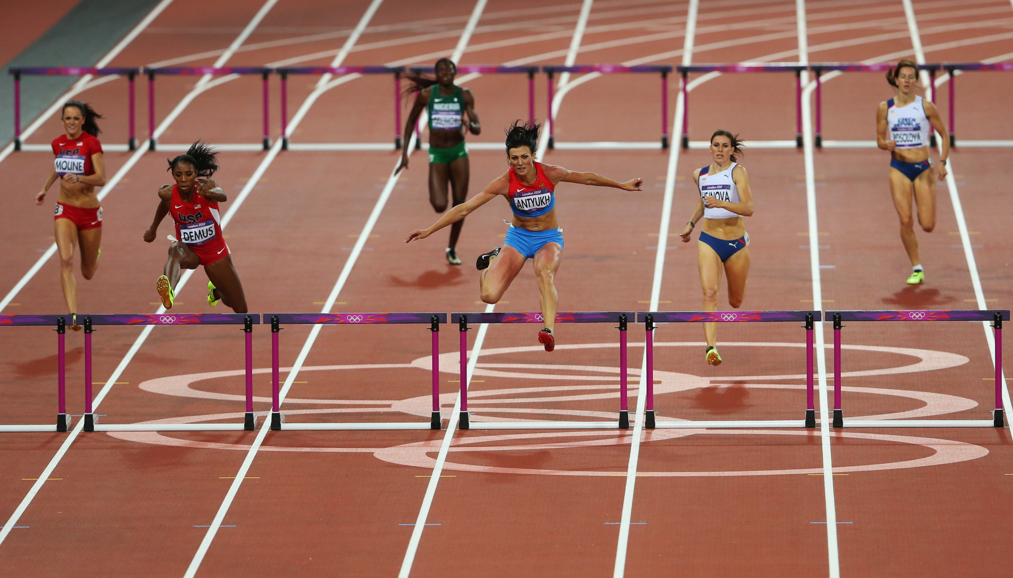 The United States' Lashinda Demus, left, narrowly missed out in the women's 400m hurdles final to Natalya Antyukh, at London 2012 but will now be officially upgraded to the gold medal ©Getty Images