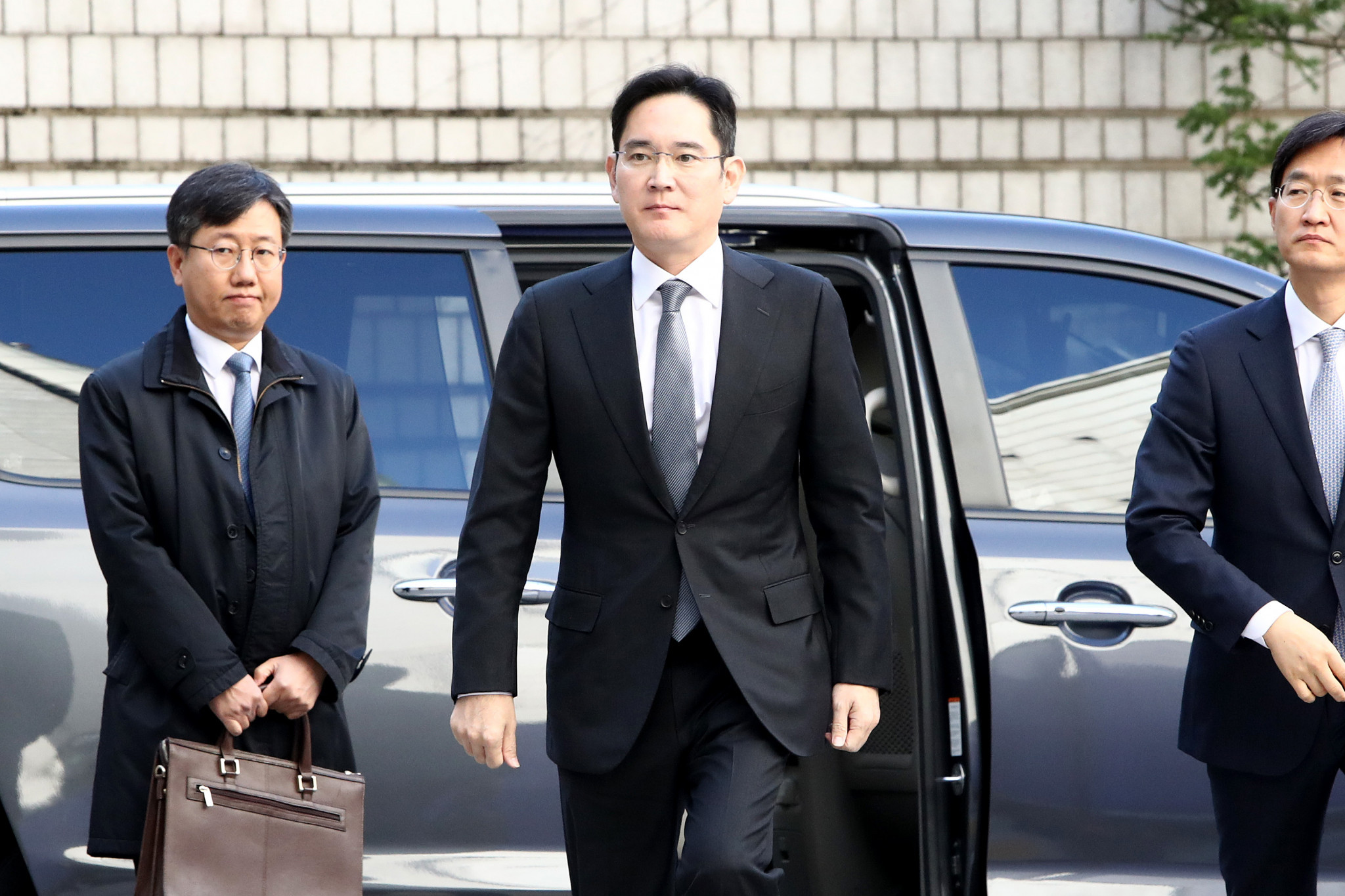 Samsung Electronics Executive Chairman Lee Jae-yong, centre, was pardoned in May ©Getty Images
