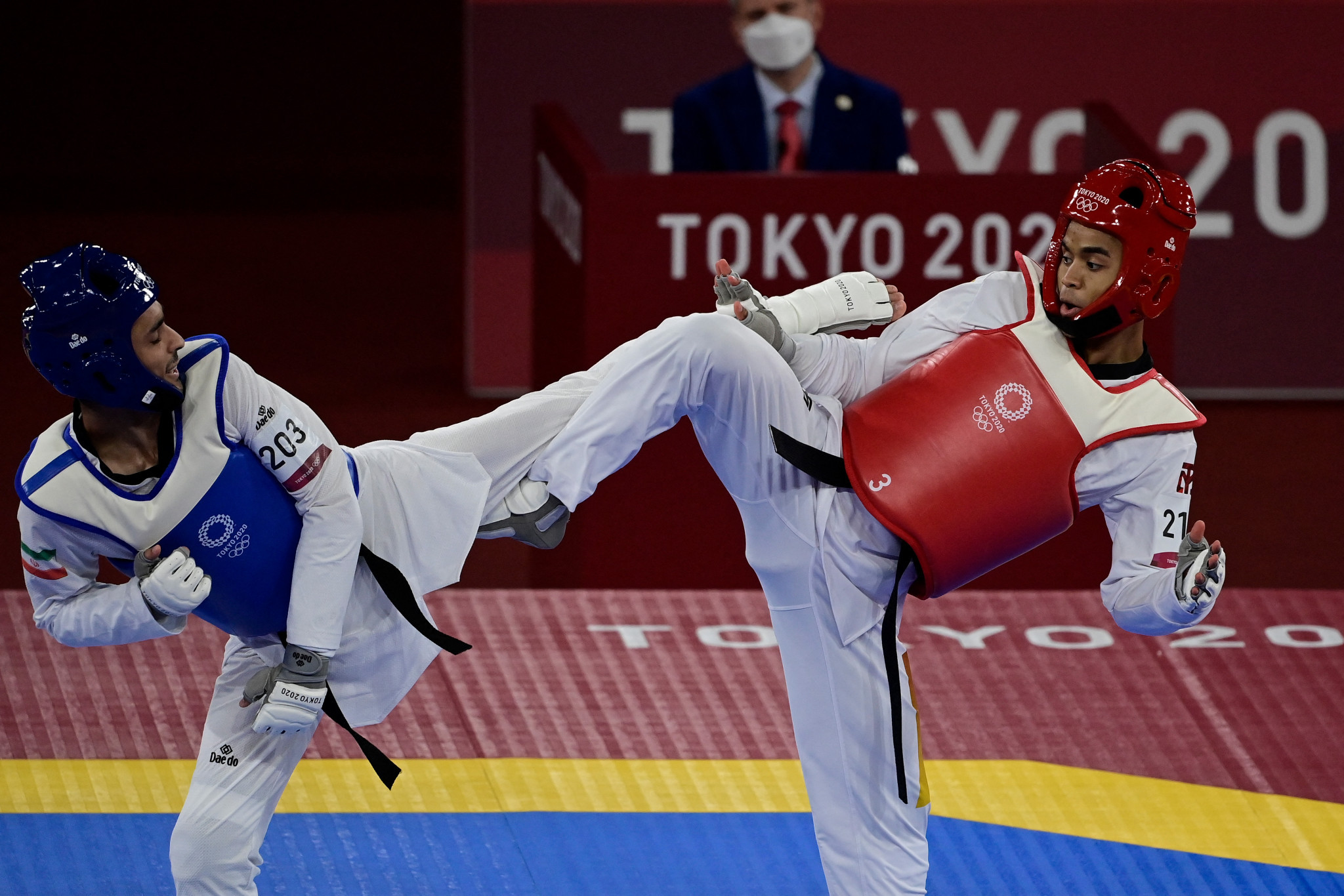 Armin Hadipour, left, competed for Iran in taekwondo at the Tokyo 2020 Olympics ©Getty Images