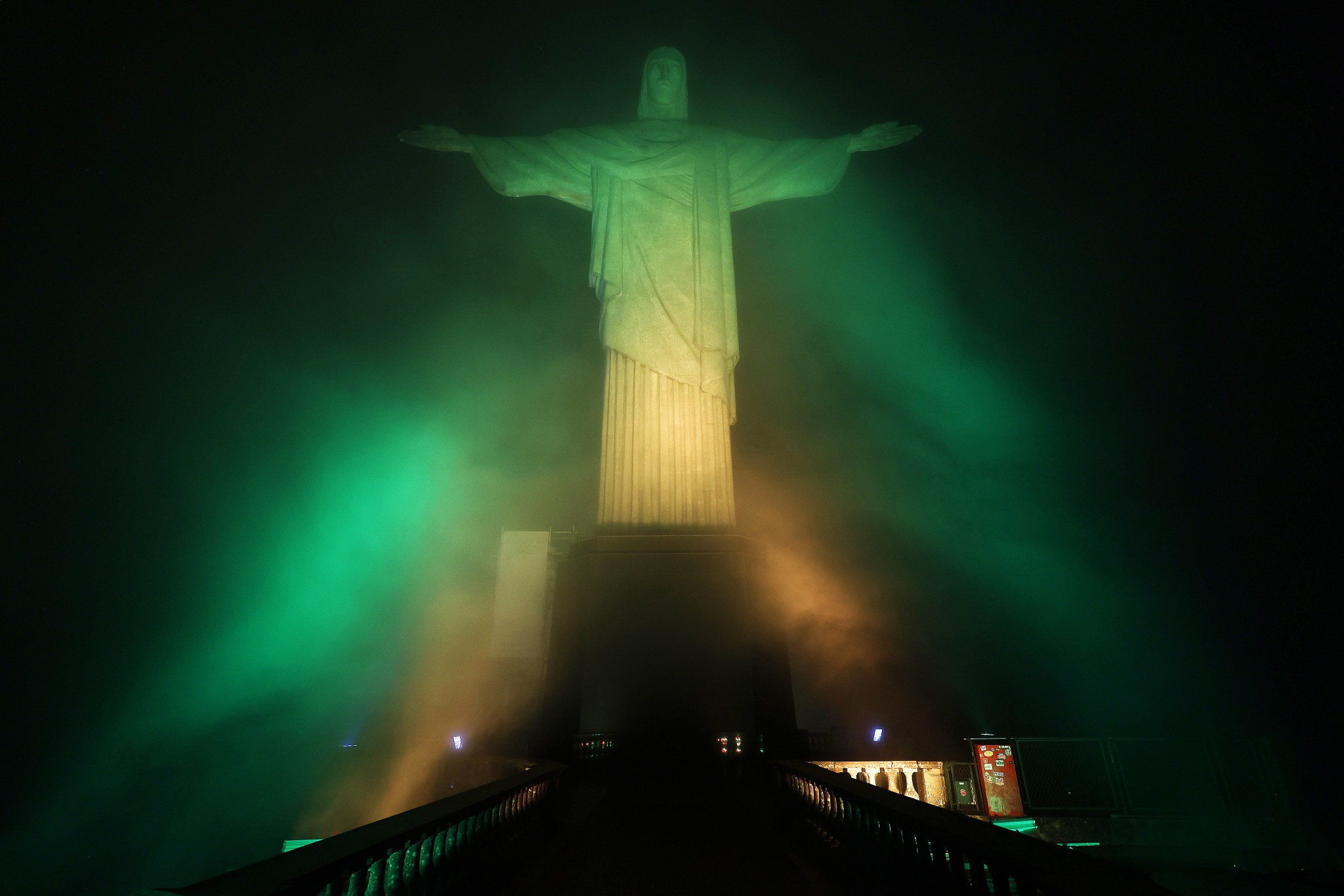 The Christ the Redeemer statue in Rio de Janeiro was lit up in the Brazilian colours to commemorate the life of Pelé ©Getty Images
