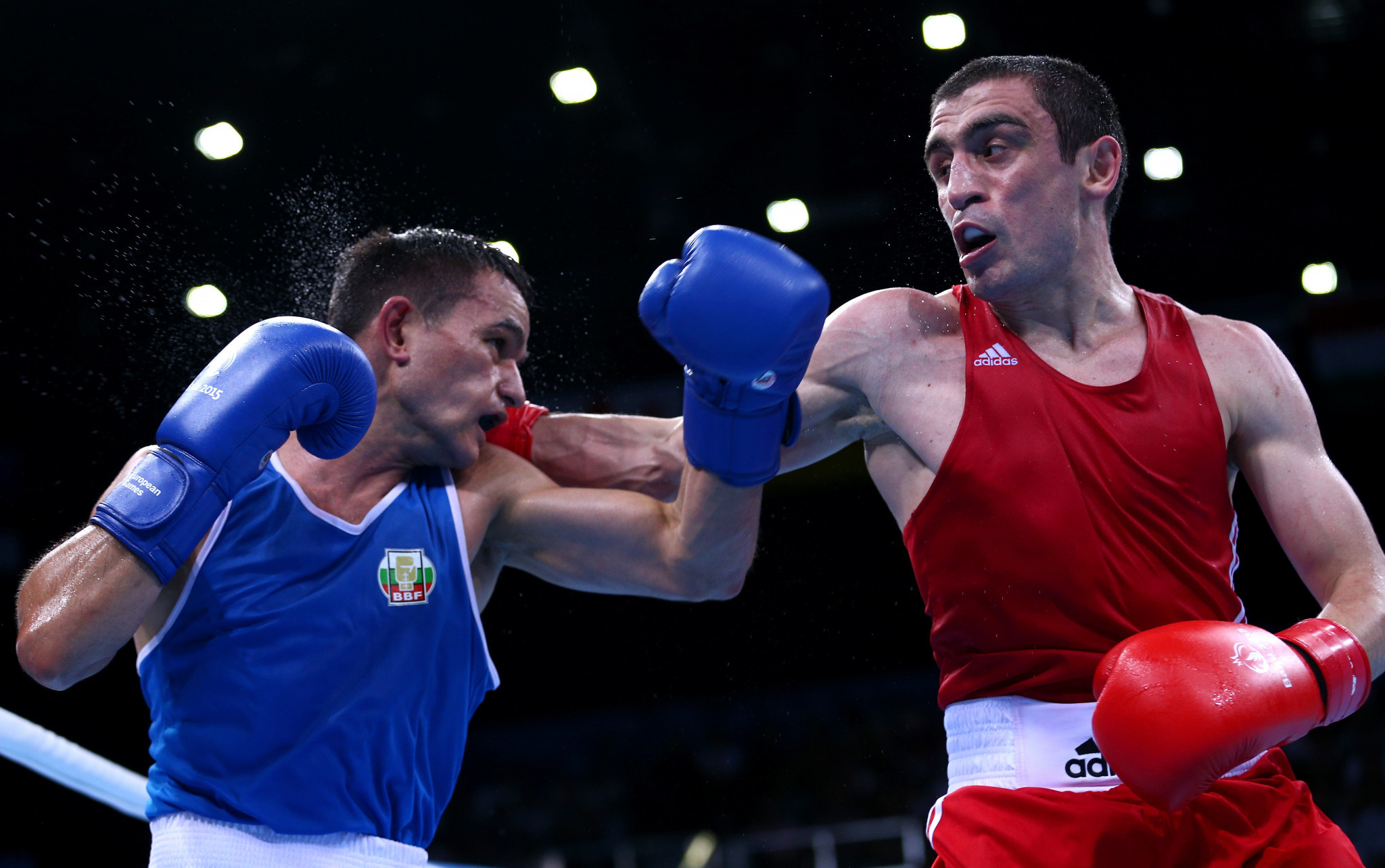 Abdulmutalim Abakarov coached Azerbaijan’s Albert Selimov, in red, during a career that included winning a World Championship title and gold medal at the European Games in Baku ©Getty Images