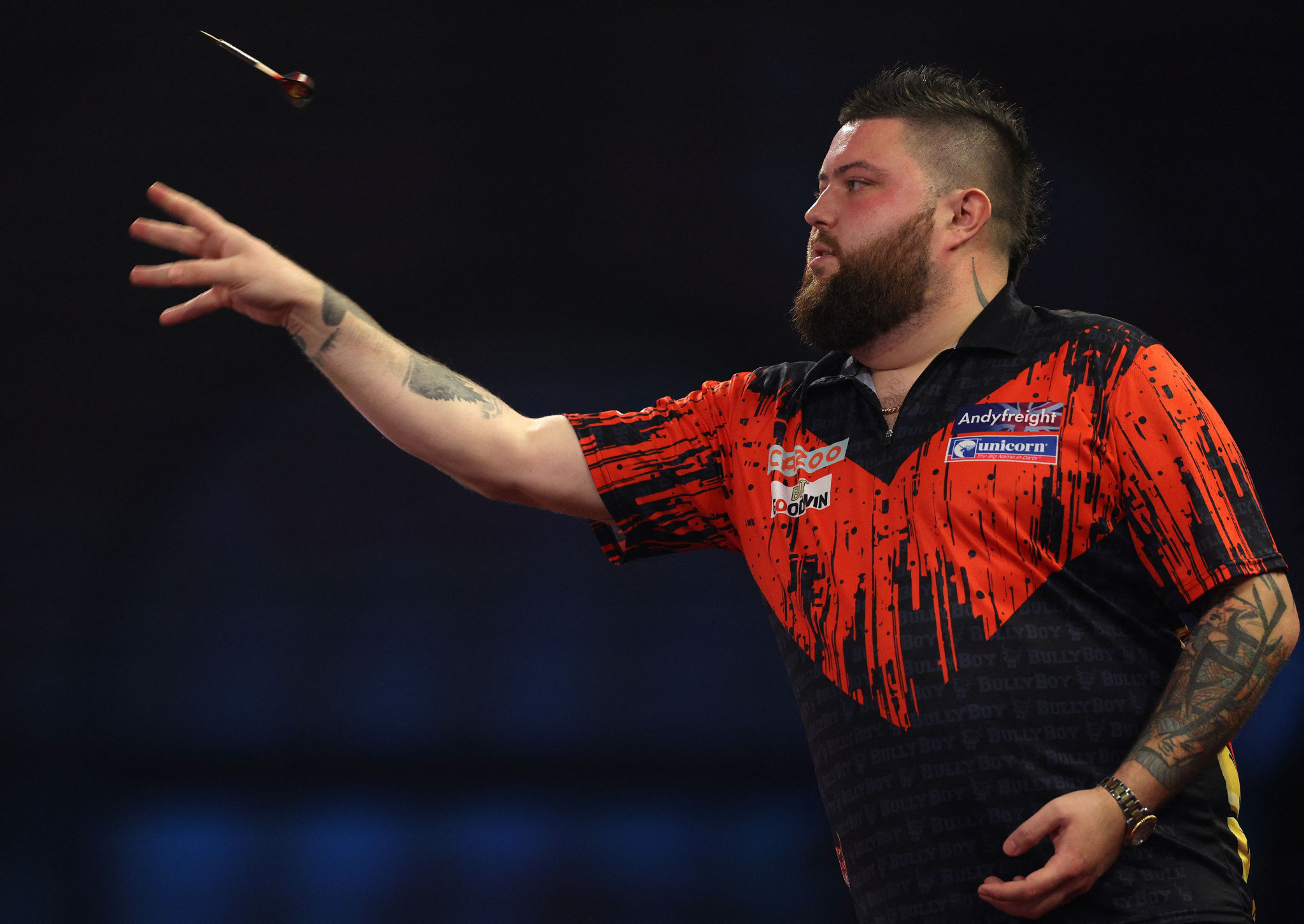 Michael Smith hit a nine-dart finish in set two on his way to winning his first PDC World Championship title ©Getty Images