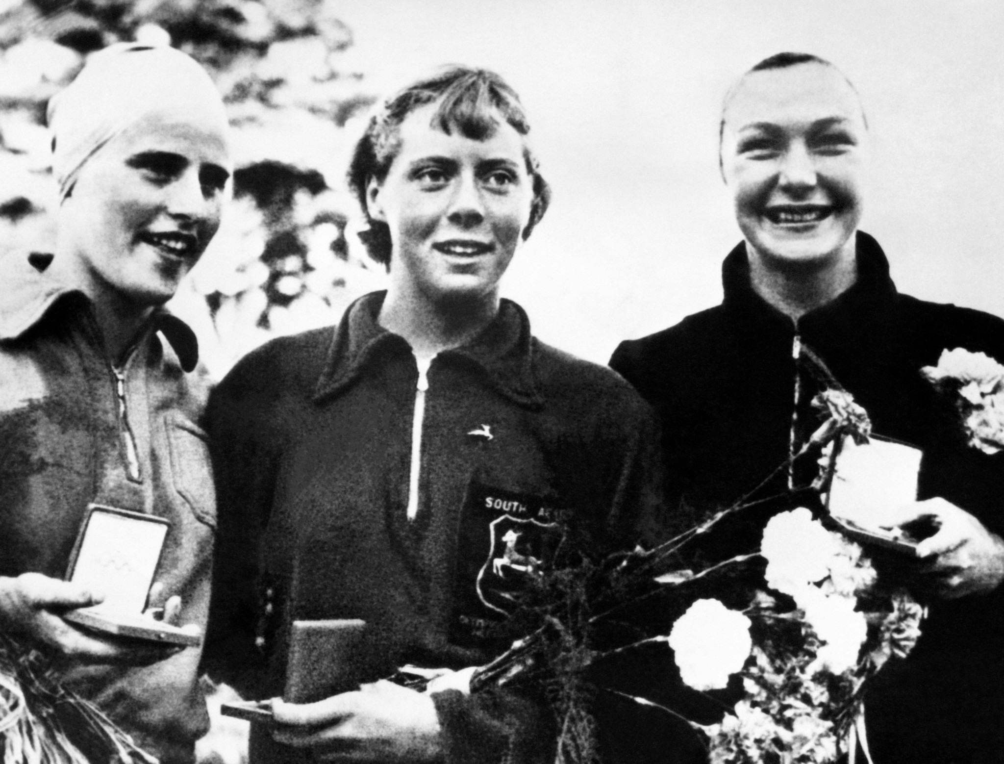 Joan Harrison, centre, won Olympic gold in 1952 when she was only 16 years old ©Getty Images