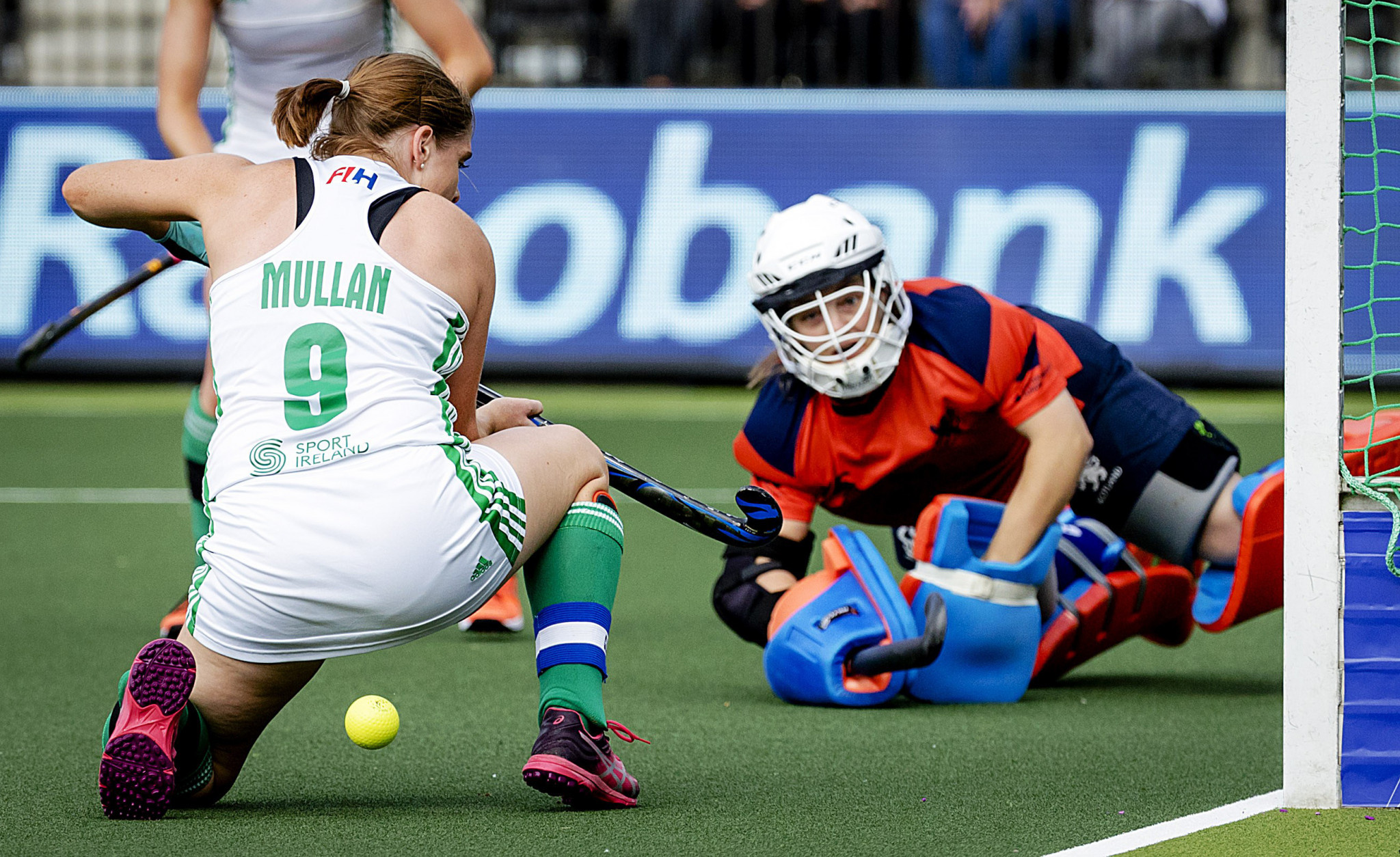 Amy Gibson, in mask, has played over 100 hockey internationals for Scotland ©Getty Images