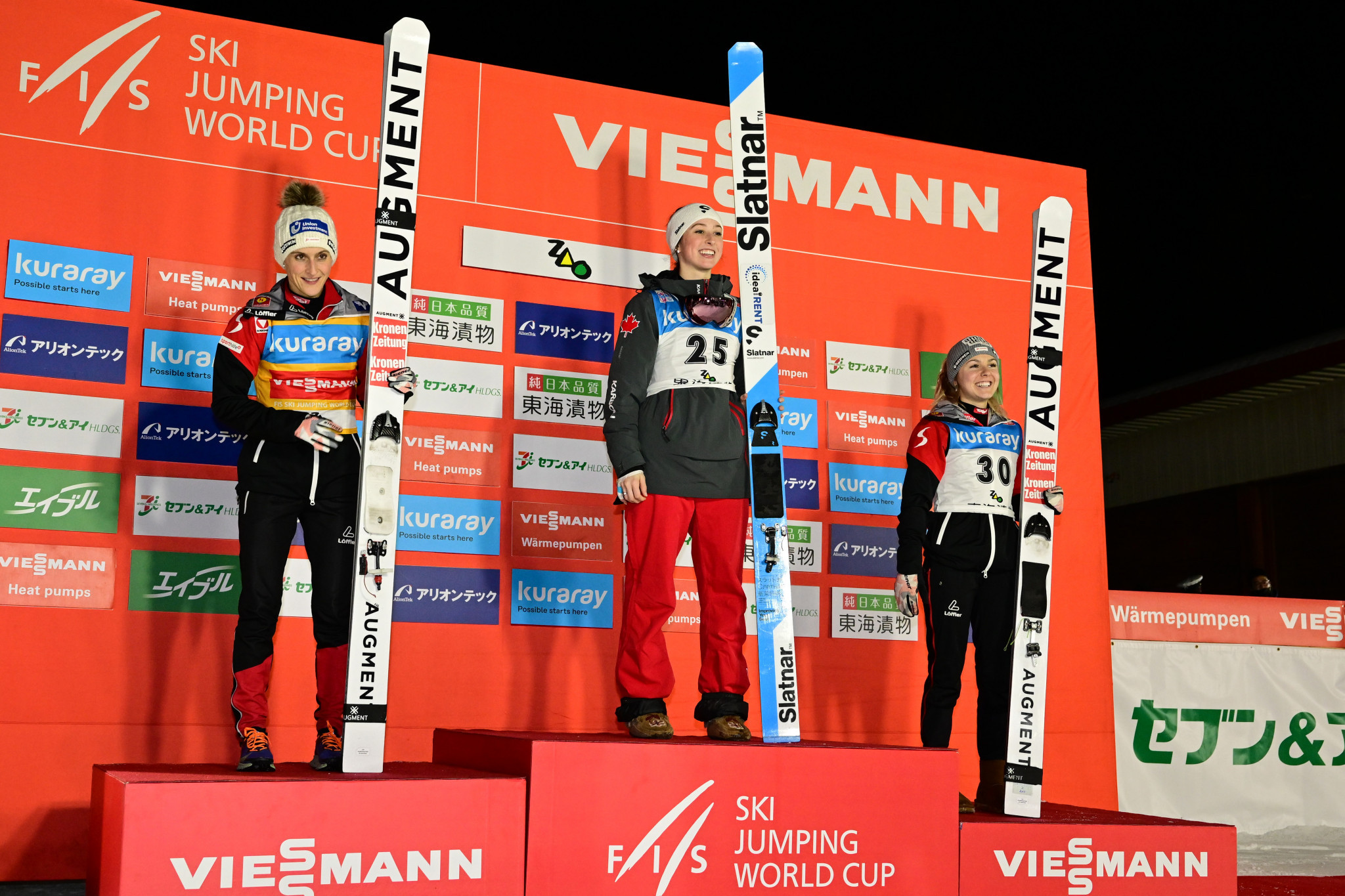 Austria's Eva Pinkelnig, left, continues to lead the overall women's standings on the Ski Jumping World Cup after a second-place finish in Zaō ©Getty Images