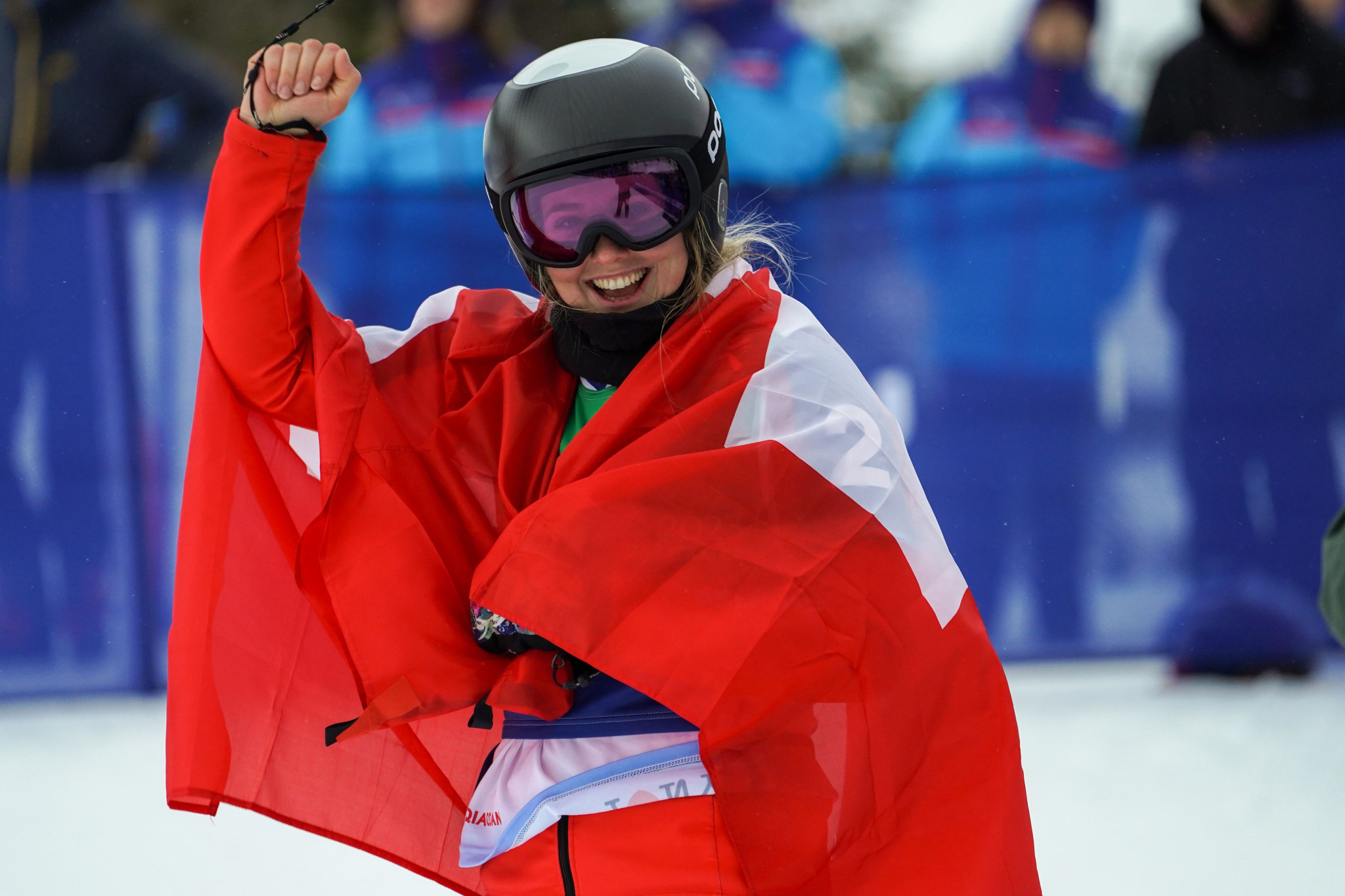 Switzerland's Sophie Hediger celebrates after claiming the women's snowboard cross title ©FISU
