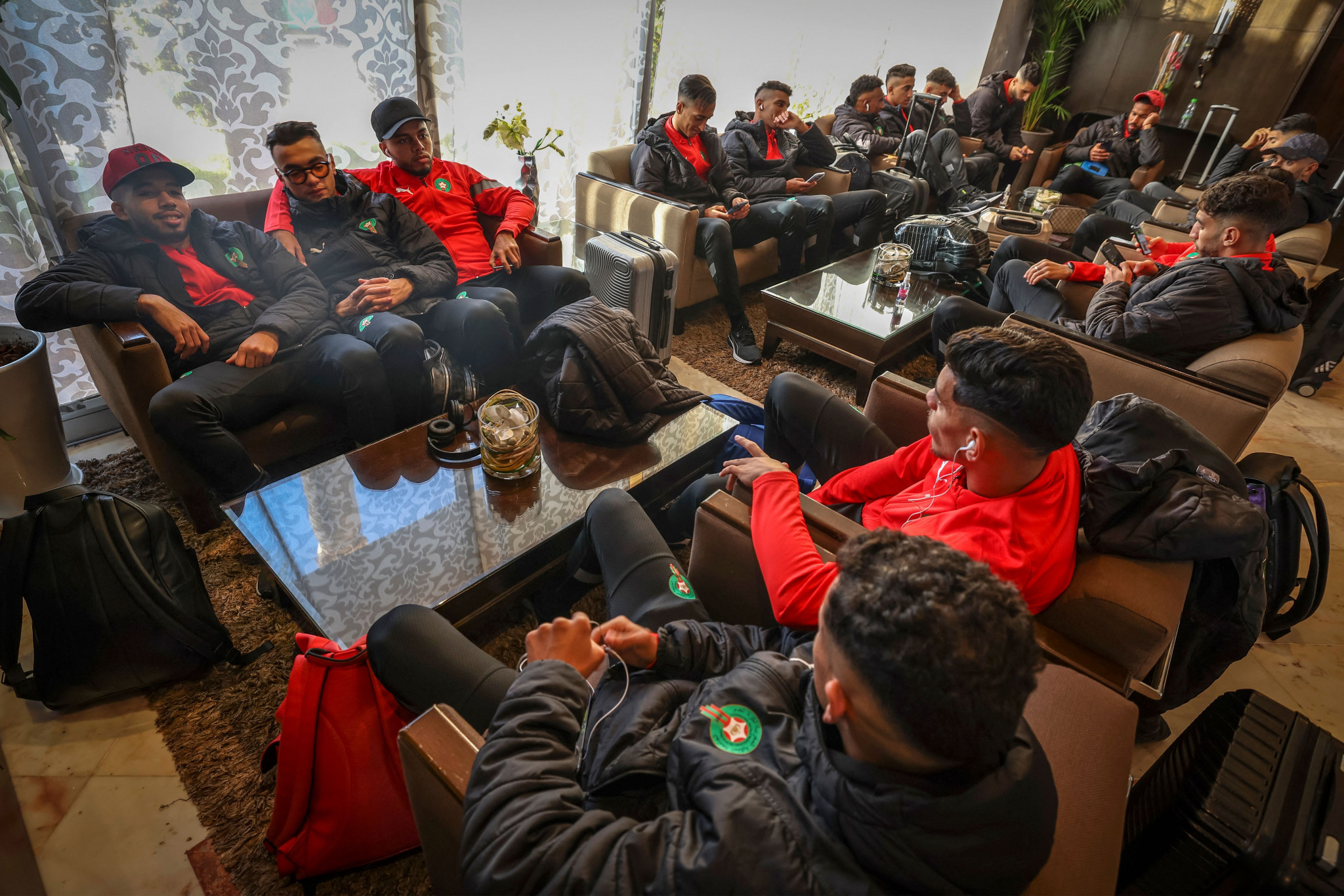 Morocco's players wait at the airport in the hope of travelling to Algeria to participate at the African Nations Championship ©Getty Images  