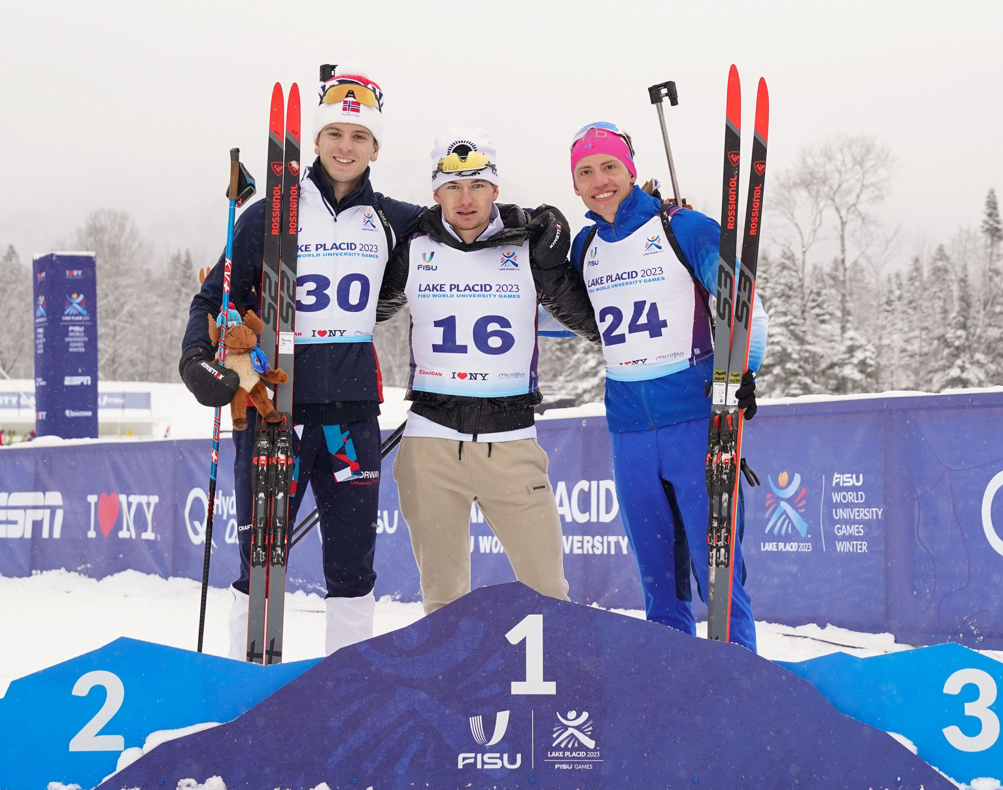 Vadim Kurales of Kazakhstan led the men's 15km biathlon, ahead of Norwegian Oerjan Moseng, left,  and France's Axel Garnier ©FISU
