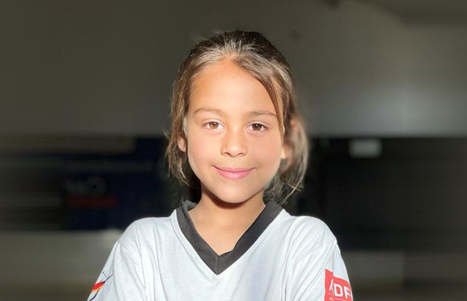 Eight-year-old refugee awarded second Dan in taekwondo