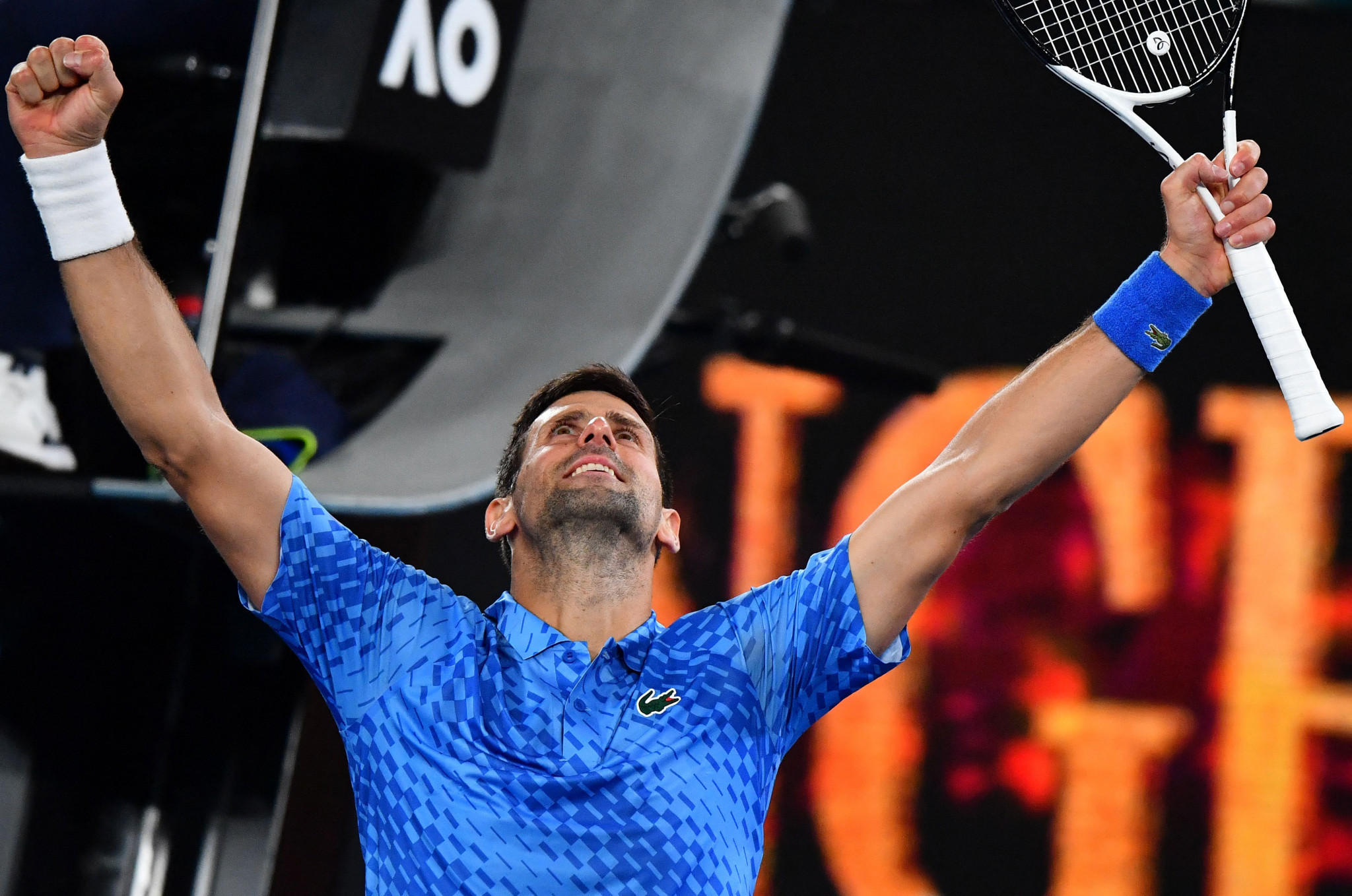 Novak Djokovic celebrates makes a winning return to the Australian Open, a year on from his deportation ©Getty Images