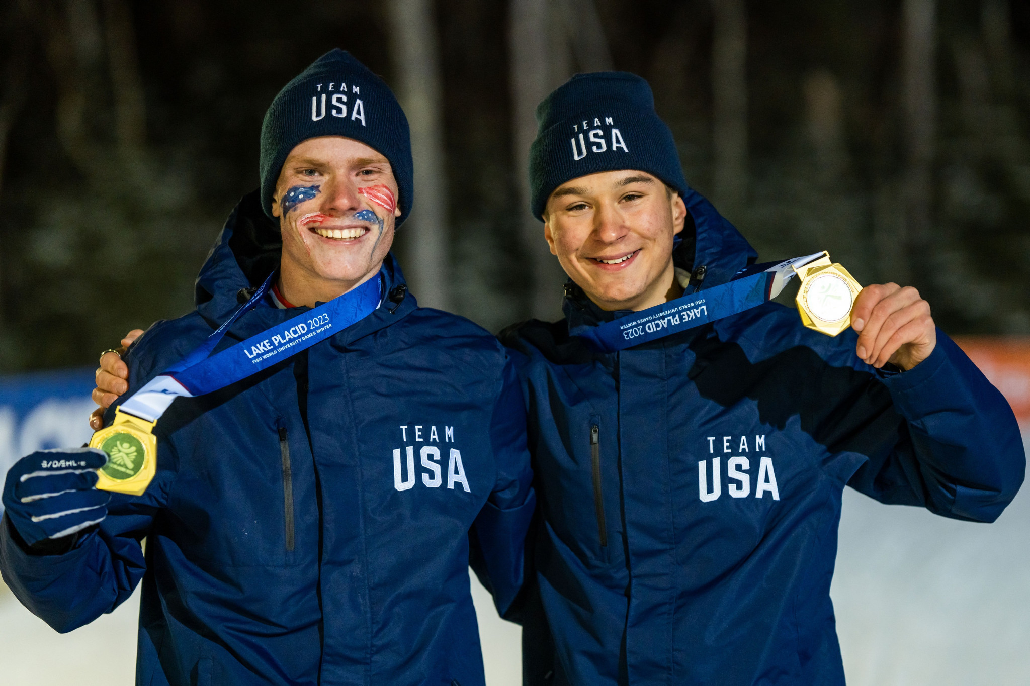 Evan Nichols, left, and Niklas Malacinski, right, celebrate the United States' first gold of Lake Placid 2023 ©FISU