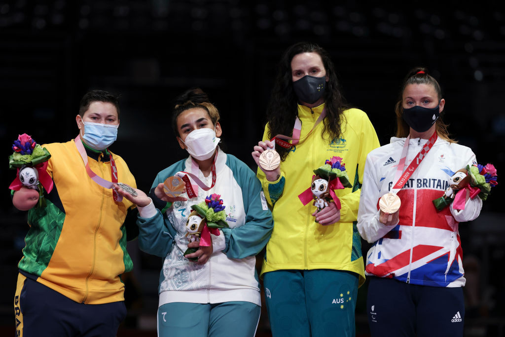 Australia’s Janine Watson, pictured second right with her bronze medal for the women’s over-58kg event at the Tokyo 2020 Olympics ©Getty Images