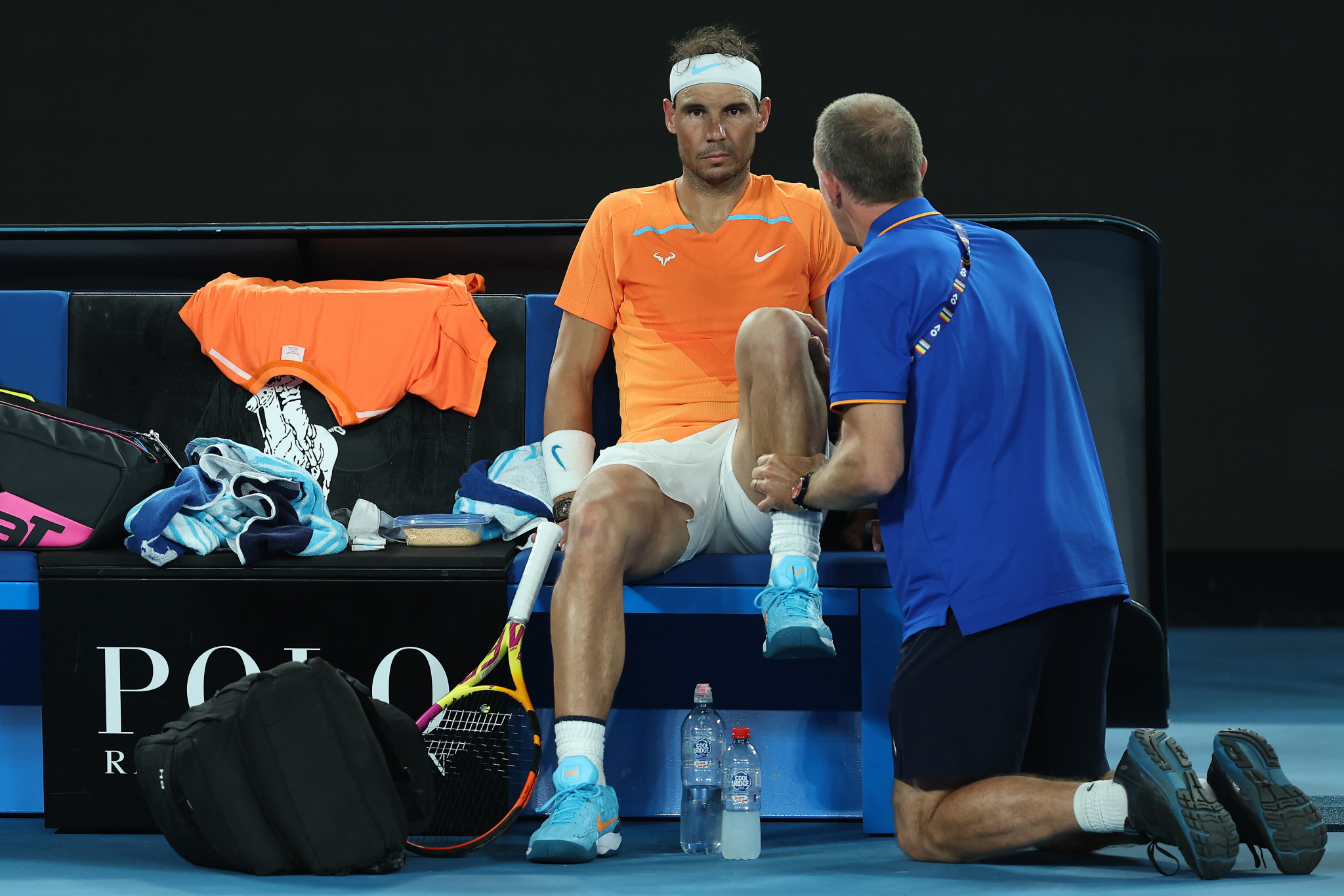 Rafael Nadal received treatment from the physio during his second-round defeat to Mackenzie McDonald ©Getty Images