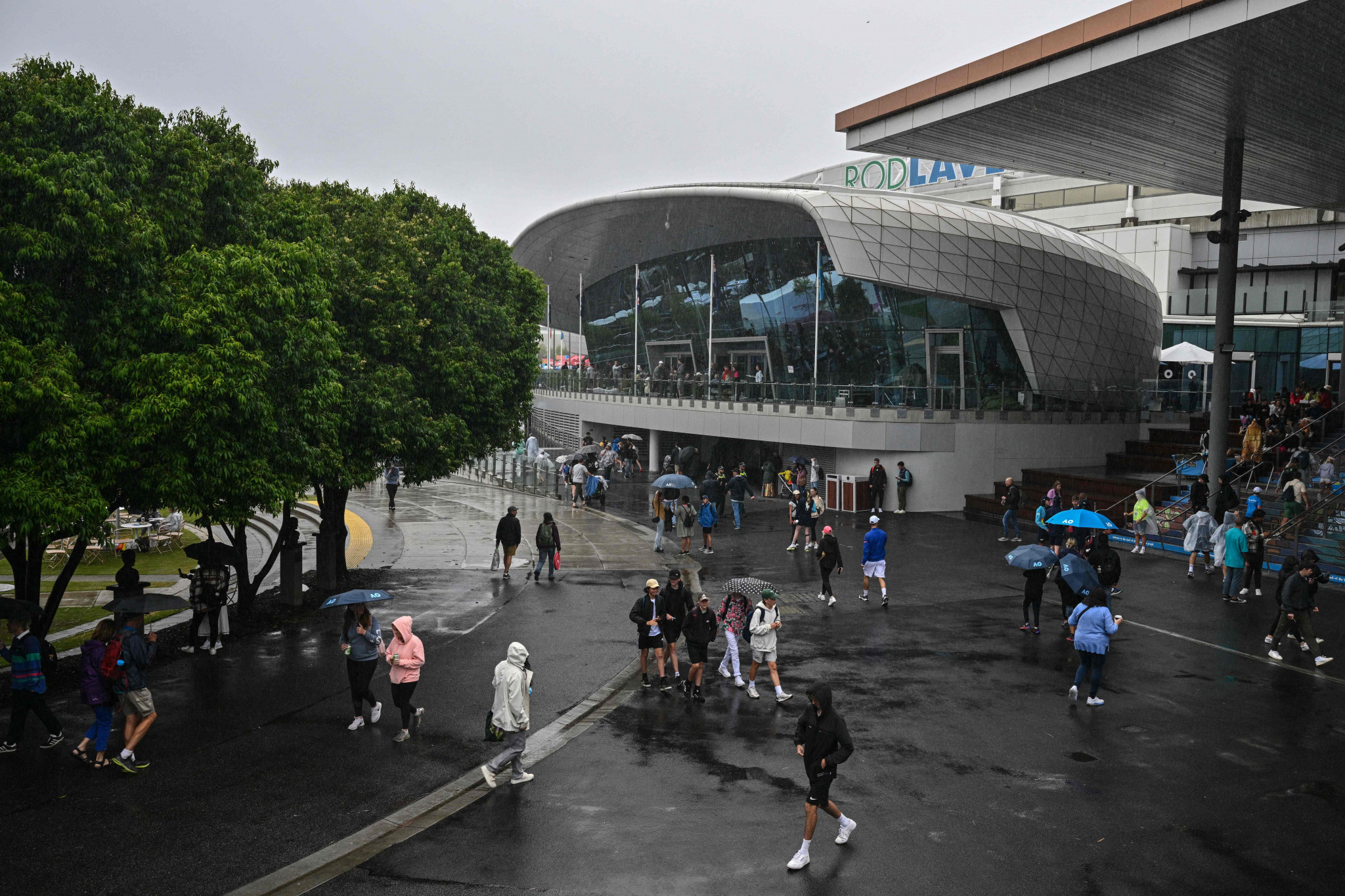 Heavy rain impacted play on day three at the Australian Open, with action on the uncovered courts limited by the weather ©Getty Images
