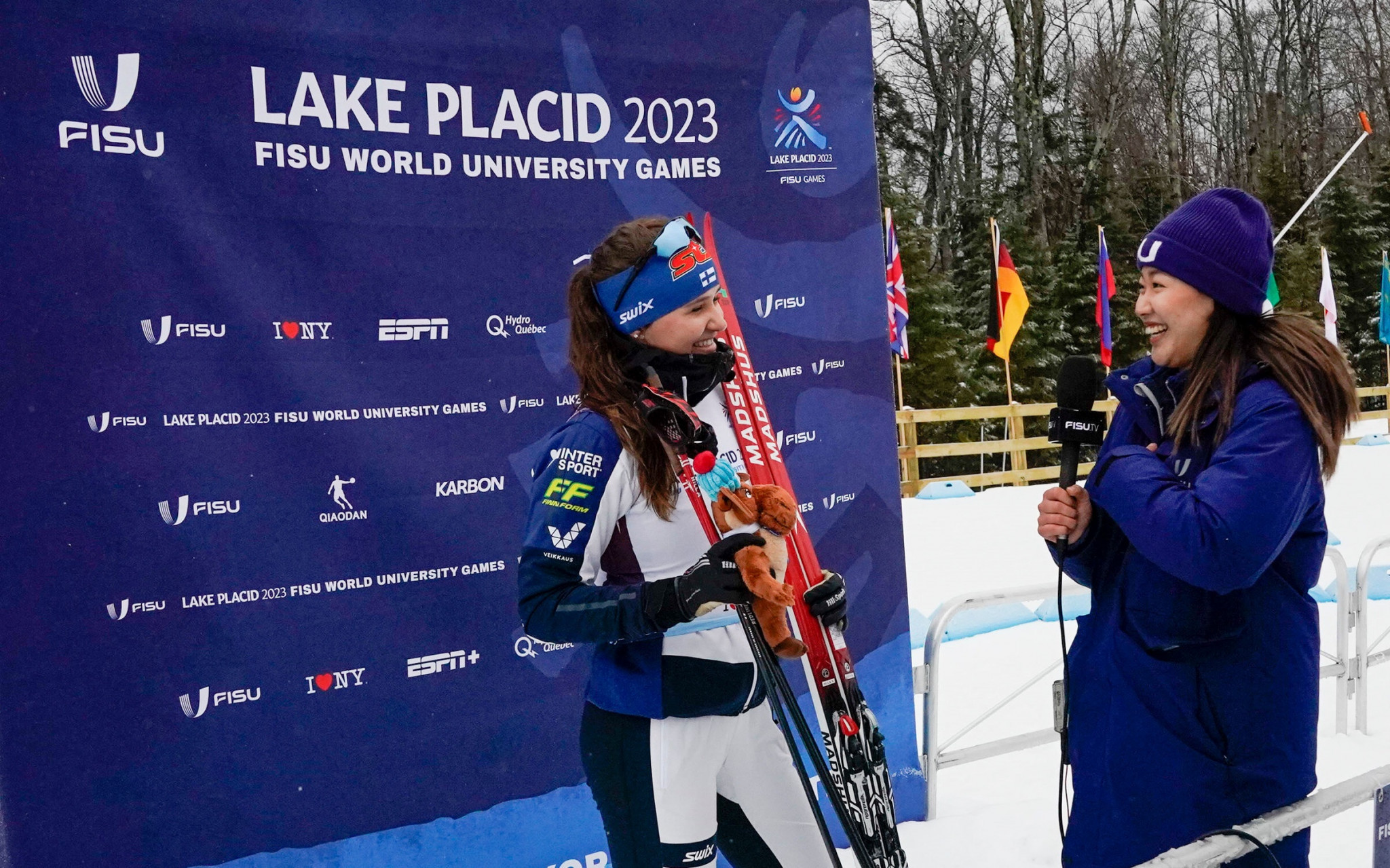 Finland's Hilla Niemela is interviewed by FISU Young Reporter Diana Hong after her victory in the women's 5km individual classic ©FISU