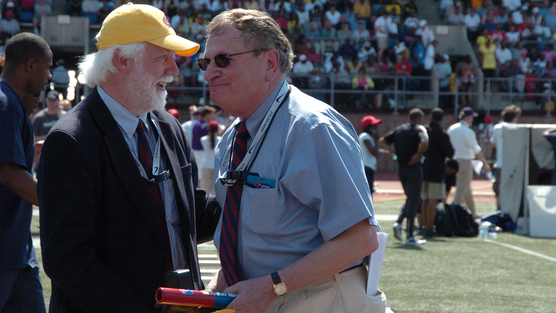 The voice of Robert Hersh, right, was familiar to athletics fans as stadium announcer at six Olympic Games and nine World Championships ©Penn Relays 