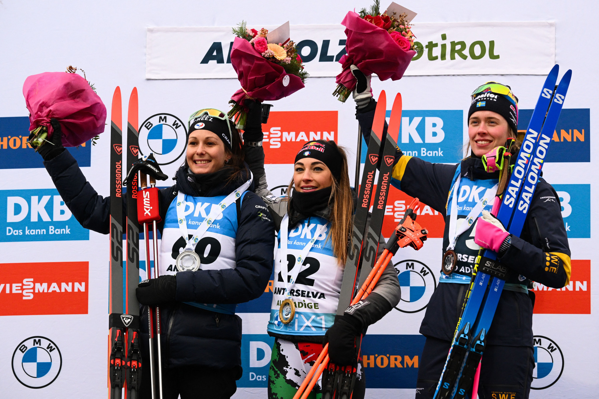 Italy's Dorothea Wierer, centre, Chloé Chevalier of France, left, and Elvira Öberg of Sweden, right, all shot clean to finish on the podium in Antholz-Anterselva ©Getty Images