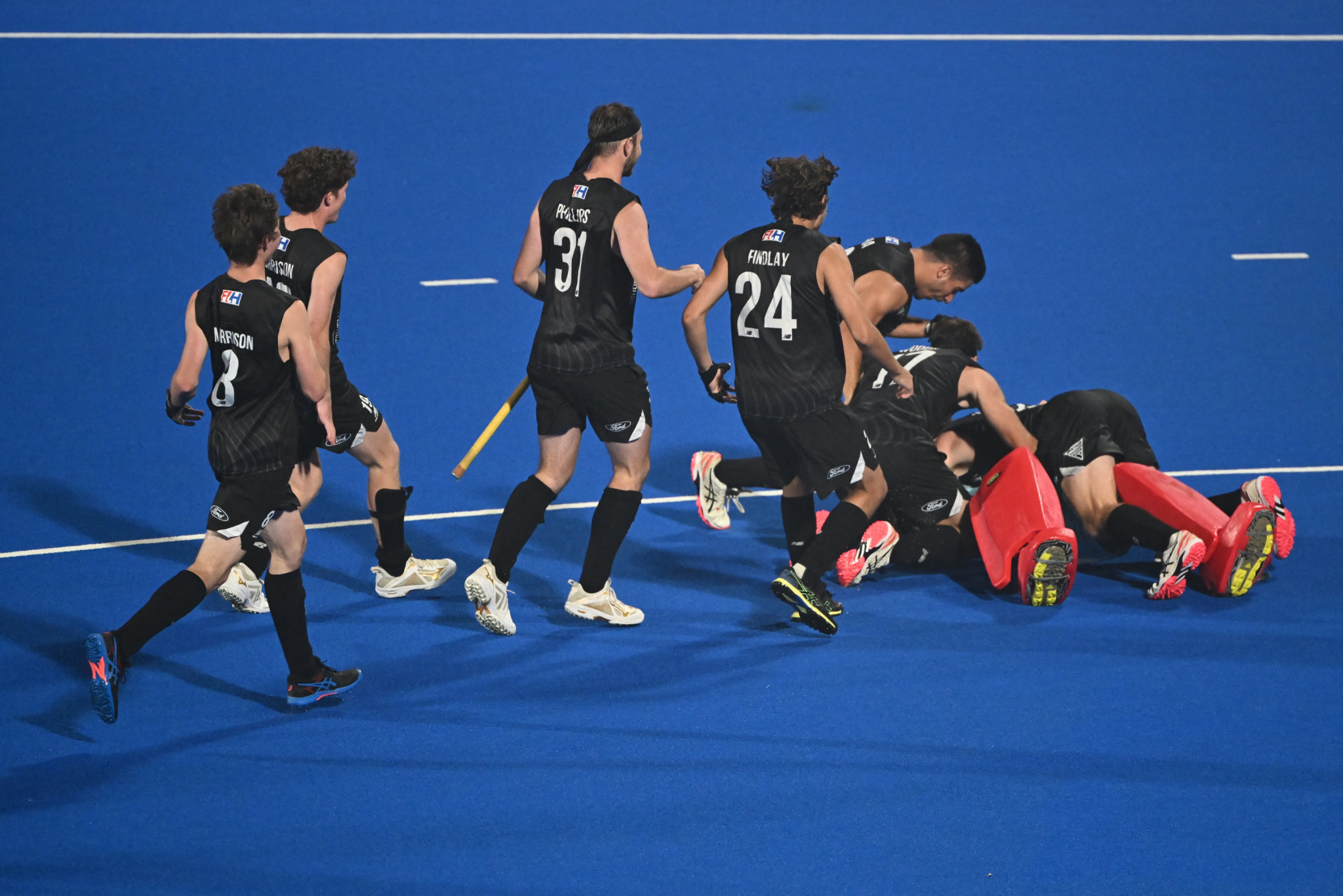 New Zealand's players celebrate after a penalty shootout triumph against India during the crossover matches at the Men's Hockey World Cup ©Getty Images 
