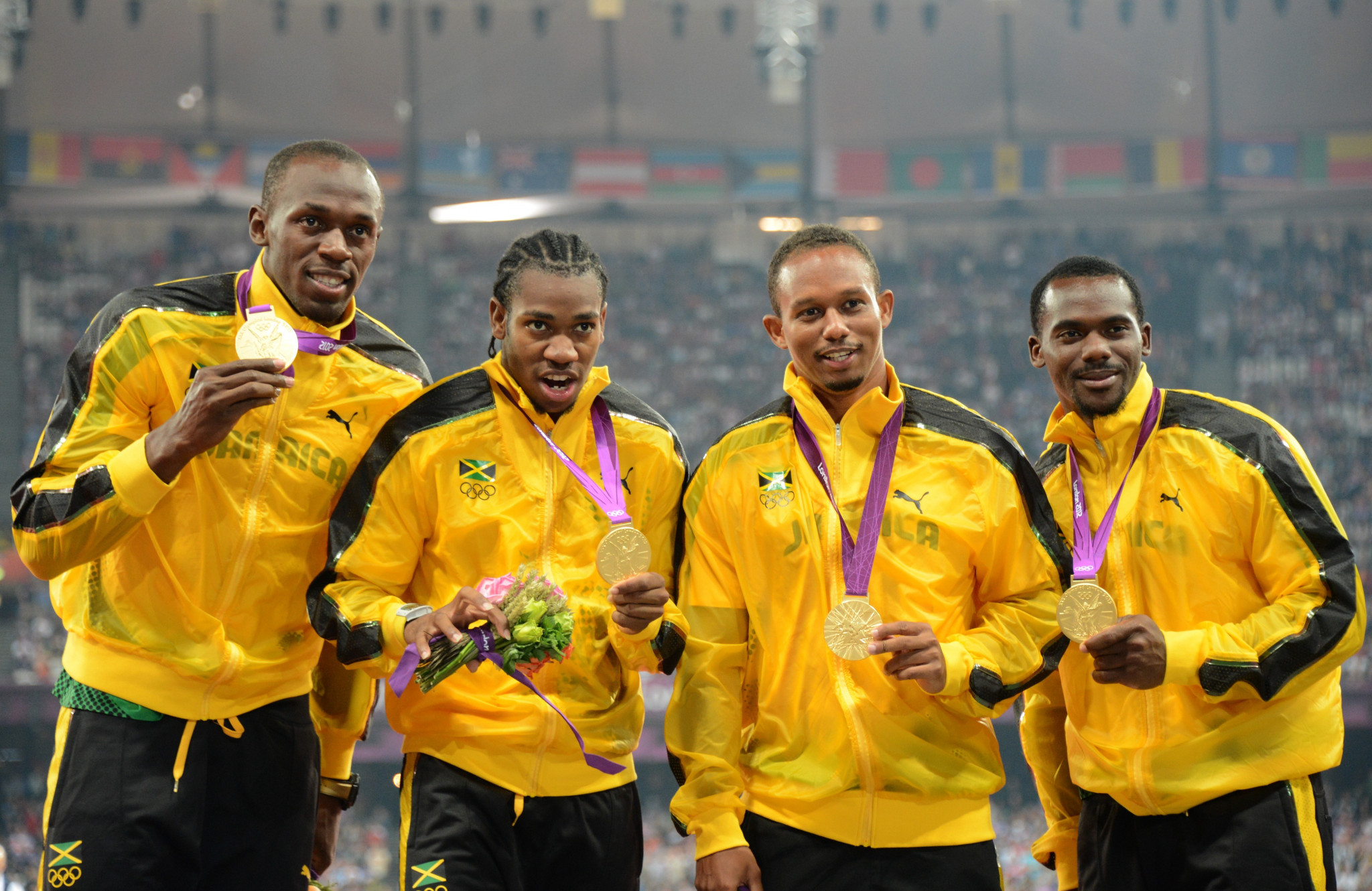 Yohan Blake, second left, has won two Olympic gold medals in the 4x100m, including at London 2012, where Jamaica set a world record that still stands ©Getty Images