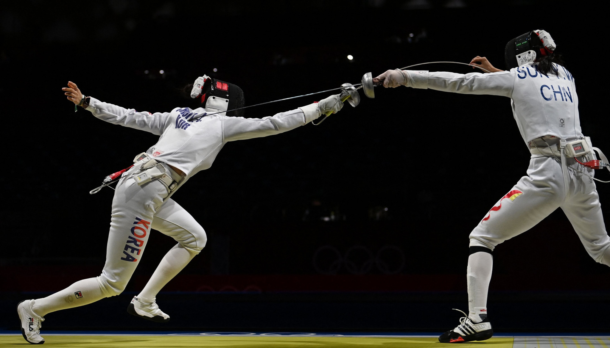 Sun Yiwen, right, plans to be fully fit by April 3 when qualification for next year's fencing competition at the Olympic Games in Paris is due to start ©Getty Images