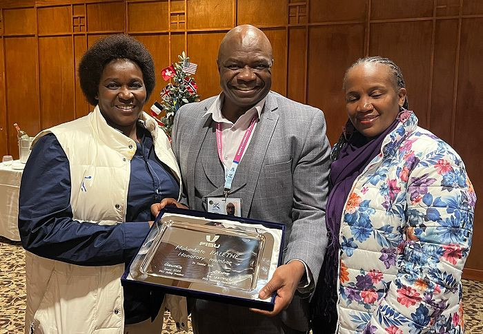 FISU presents South Africa's Ralethe with Honorary Member Award at Lake Placid 2023