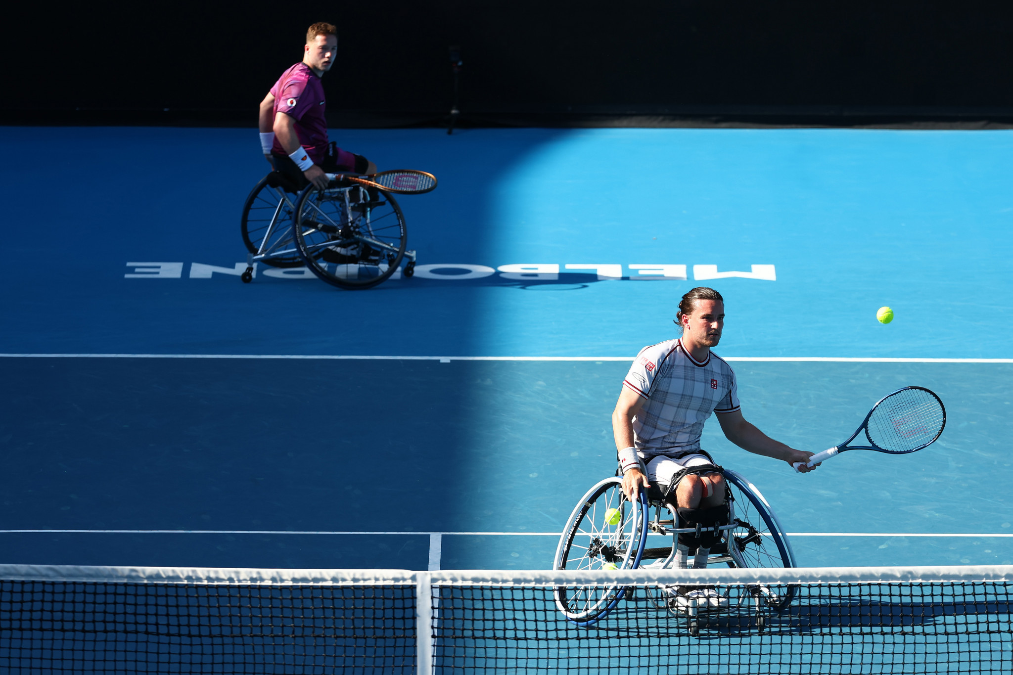 Britain's Alfie Hewett and Gordon Reid celebrate winning the men's wheelchair doubles title in Melbourne ©Getty Images