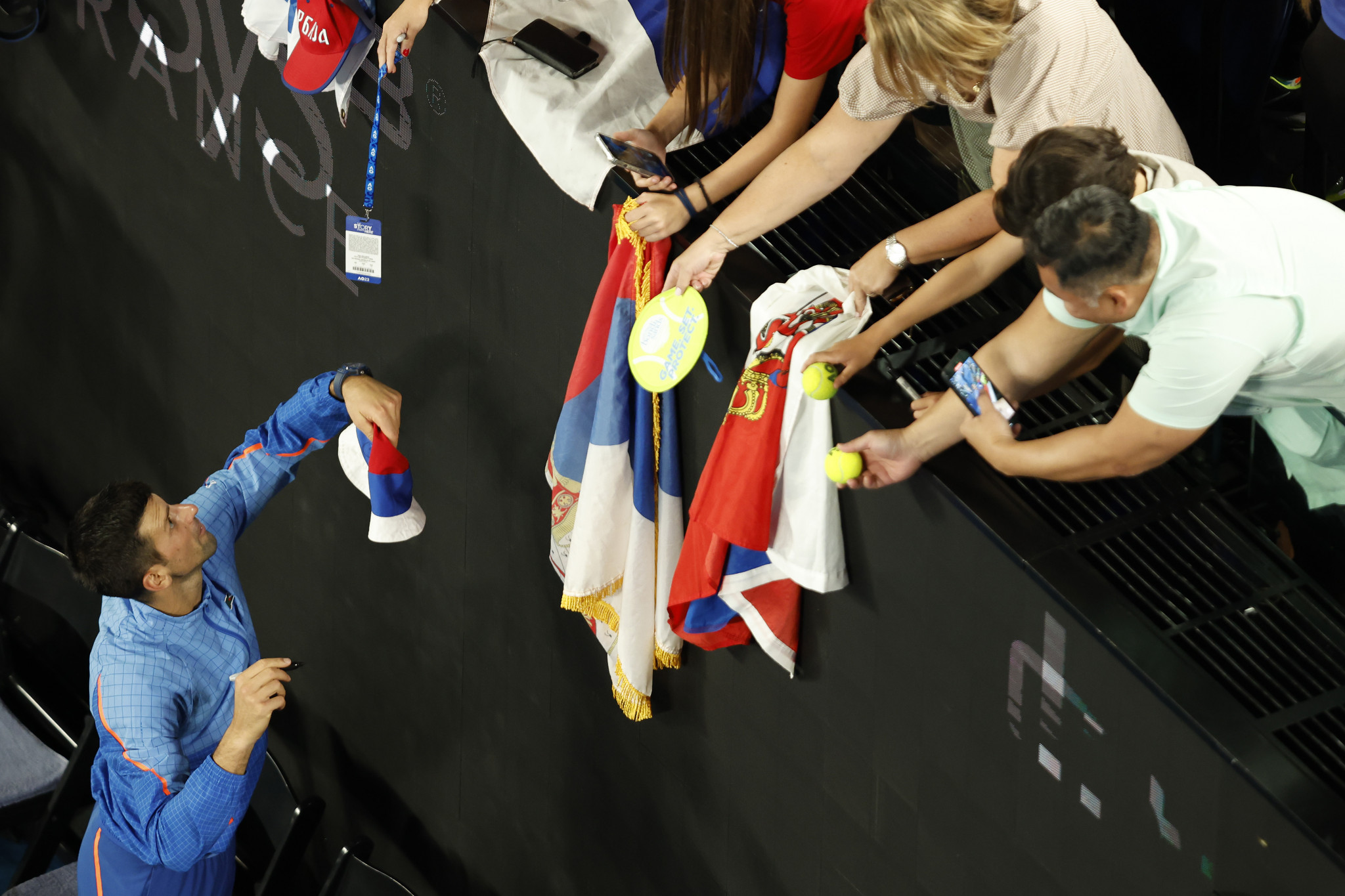 Novak Djokovic greets Serbian fans at the Australian Open in Melbourne ©Getty Images
