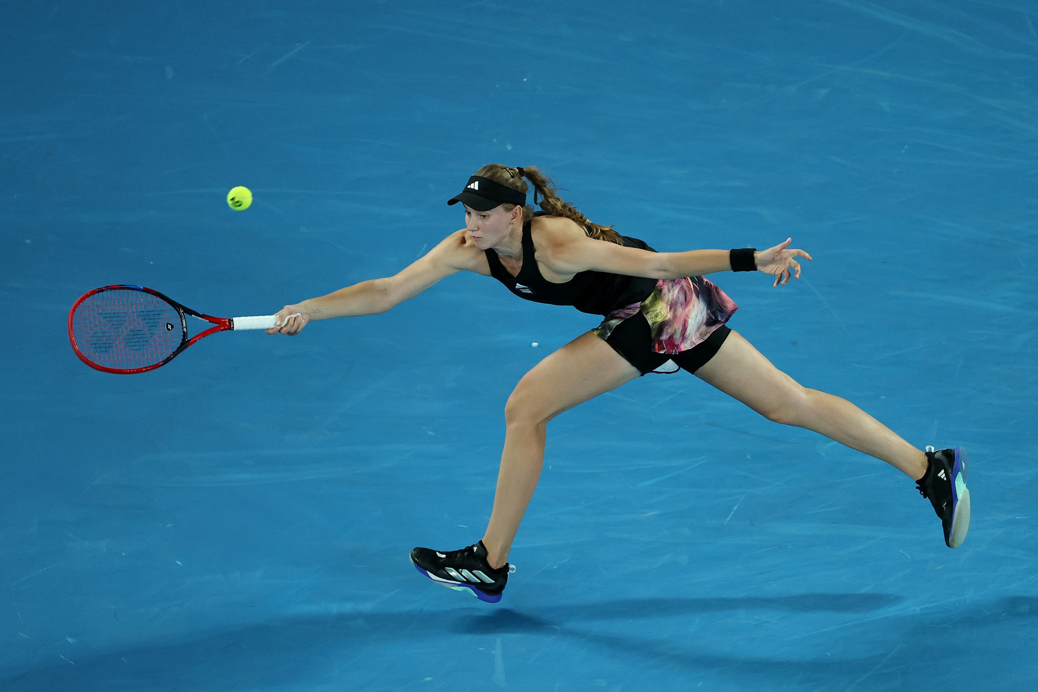 Rybakina scrambles to retrieve the ball as she battled hard against the Belarusian ©Getty Images