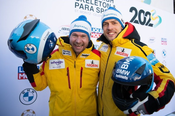Johannes Lochner, left, and Georg Fleischhauer, right, are leading at the halfway stage in the two-man bobsleigh competition in St Moritz ©IBSF