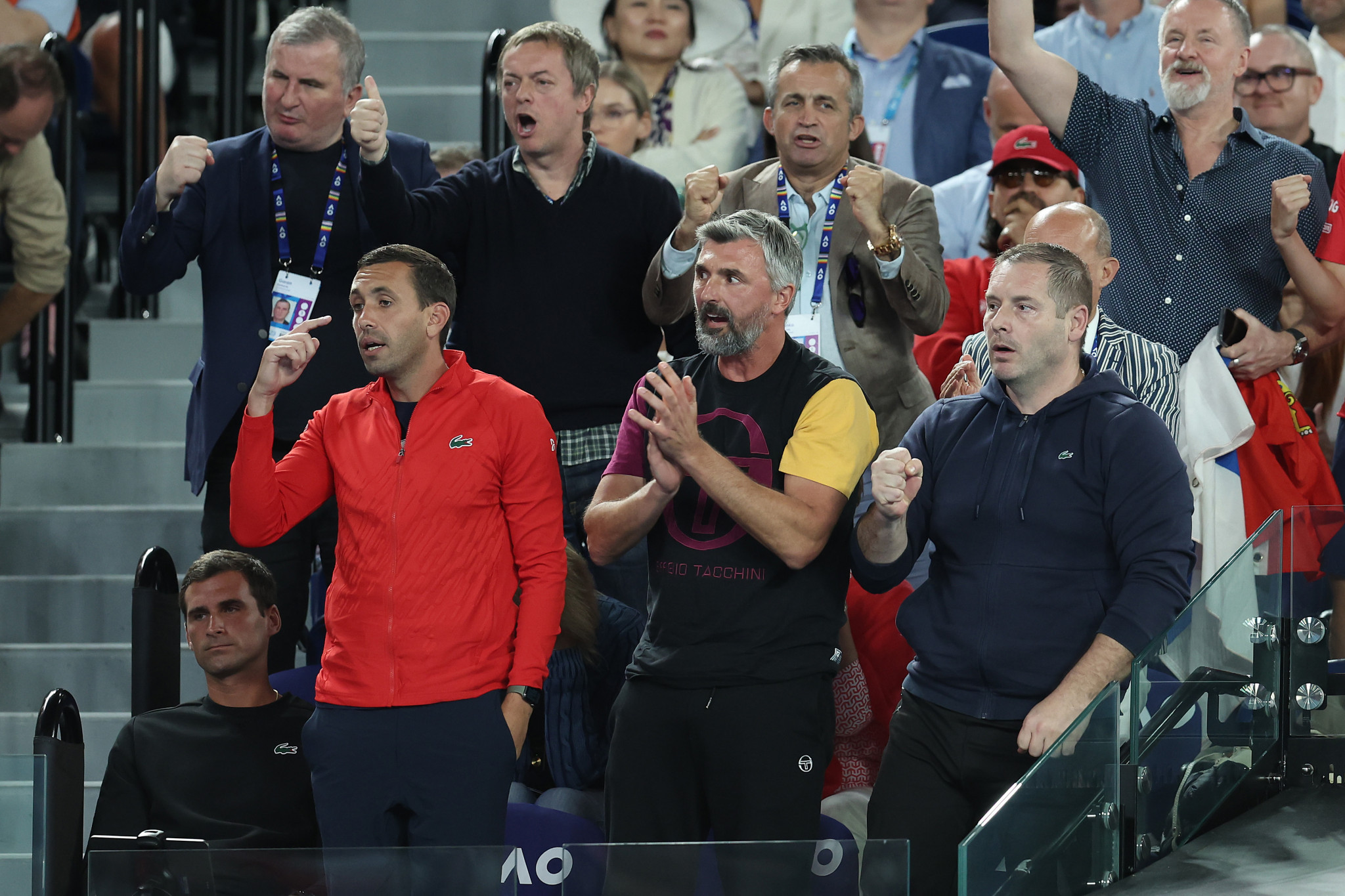 Novak Djokovic's box, including coach Goran Ivanisevic, centre, celebrate a point during the final against Tsitsipas ©Getty Images