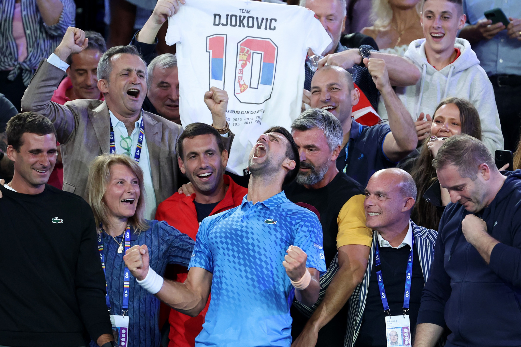 Novak Djokovic celebrates in his player box following his victory in the men's singles final ©Getty Images